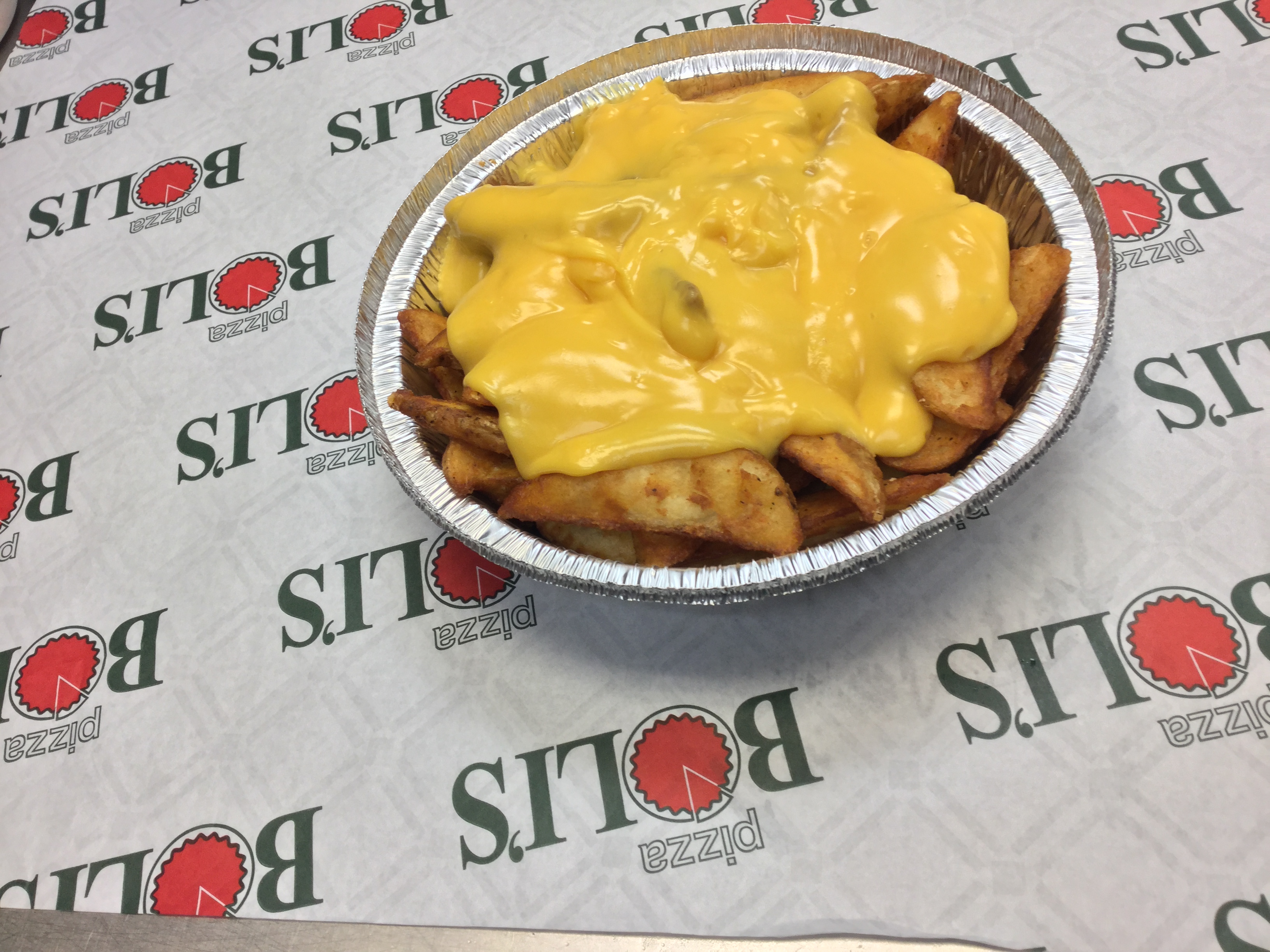 Order Crispy French Fries with Cheddar Cheese Sauce food online from Pizza Bolis store, Brooklyn on bringmethat.com