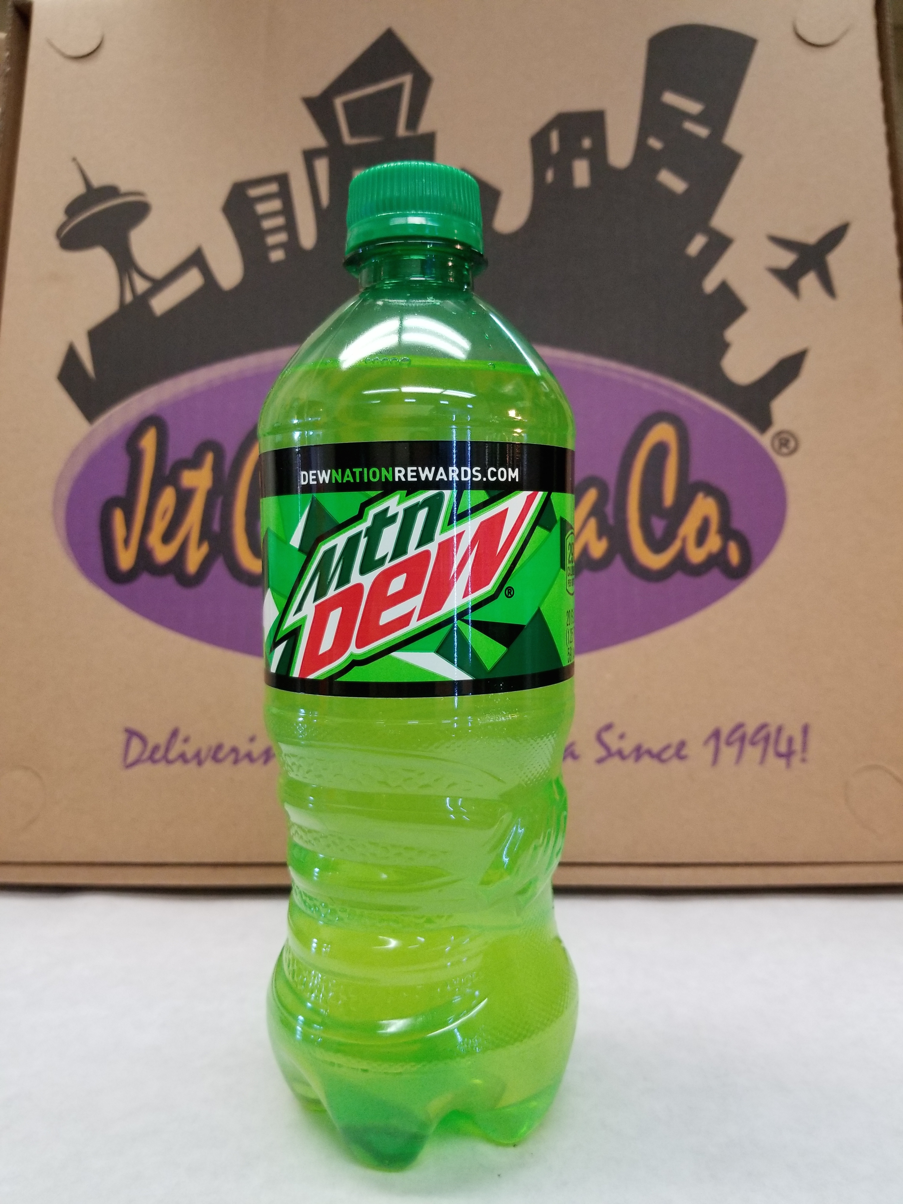 Order 20 oz Mountain Dew Bottled Soda food online from Jet City Pizza Co. store, Seattle on bringmethat.com