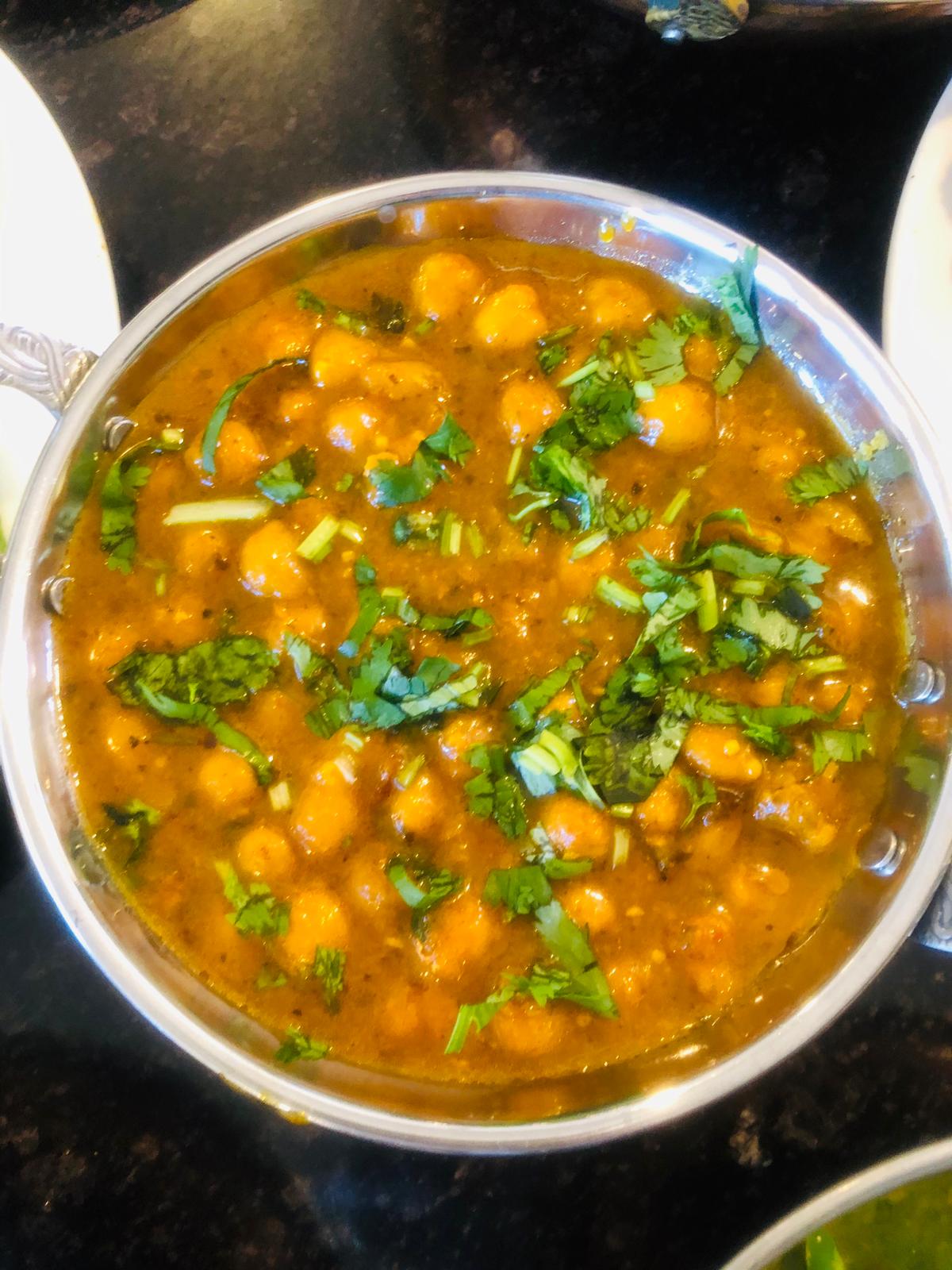 Order Chana Masala food online from The Amarvilas store, Stockton on bringmethat.com