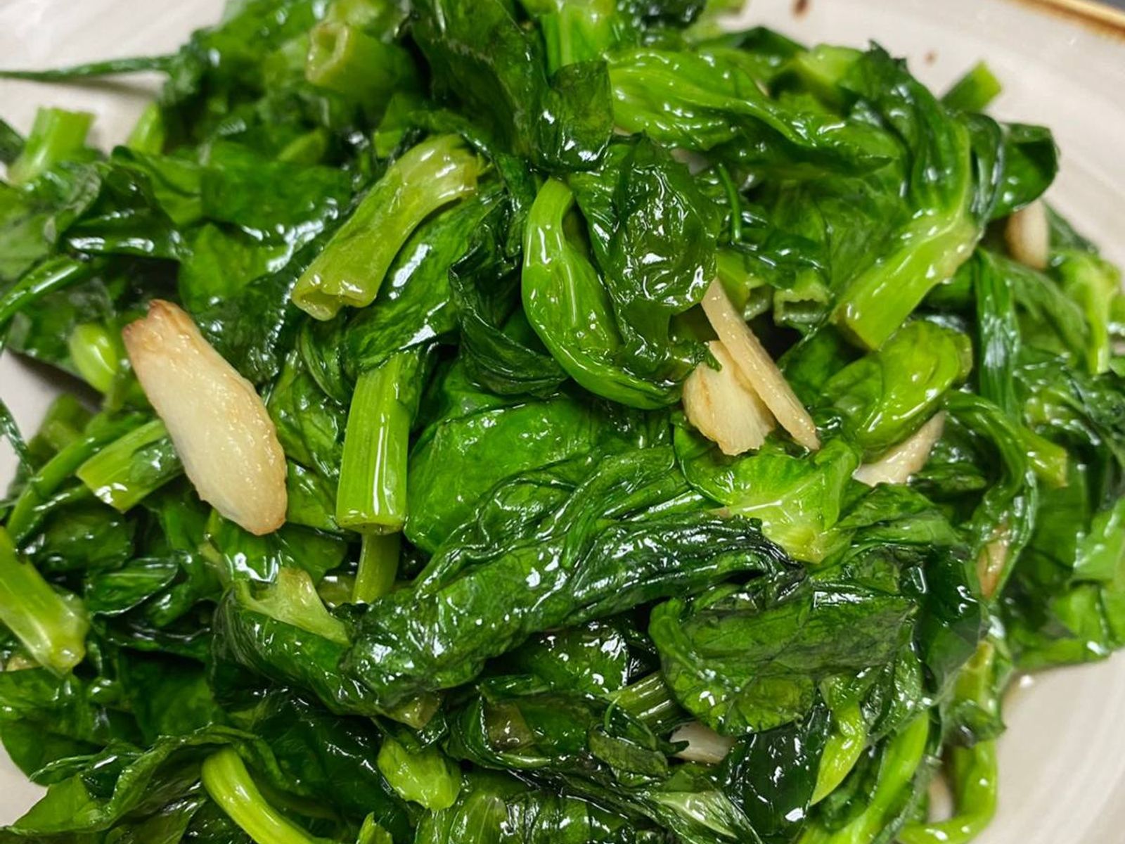 Order Snow Pea Leaves food online from Rice Bowl Cafe store, Austin on bringmethat.com