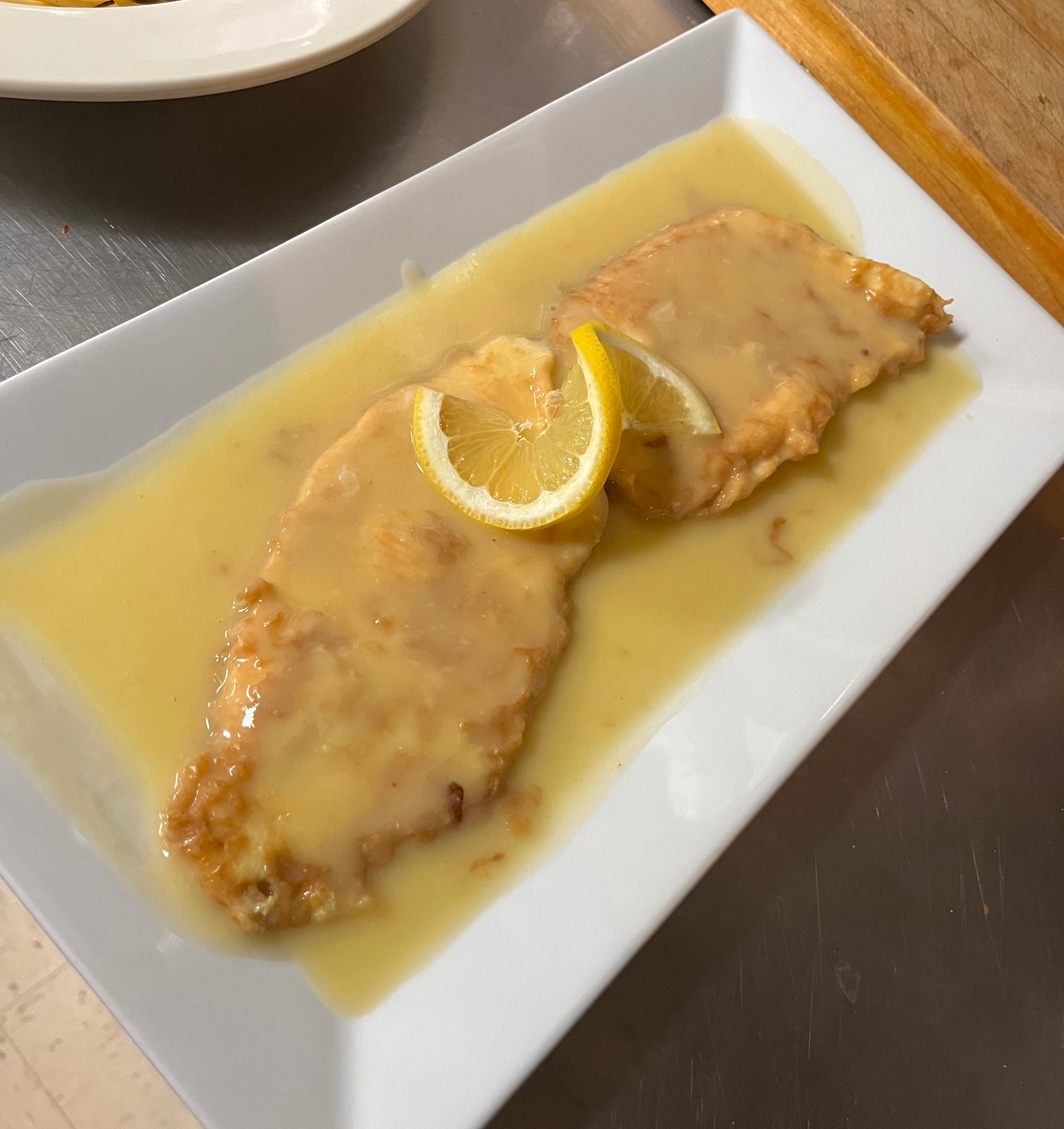Order Chicken Francese - Entrees food online from Angelina Fine Foods store, Cold Spring on bringmethat.com