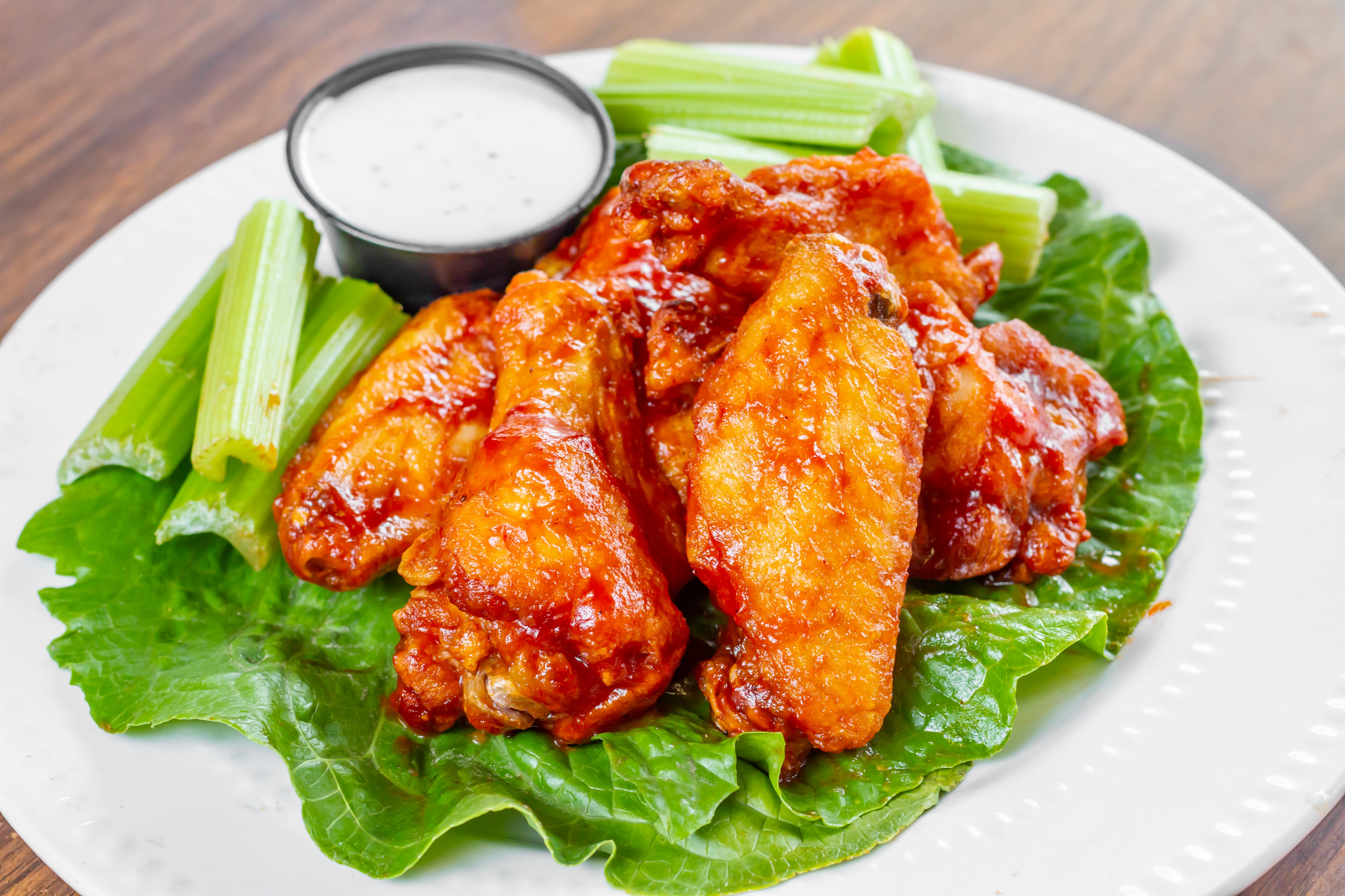 Order Buffalo Wings - 10 Pieces food online from Happy House Pizzeria store, Deale on bringmethat.com
