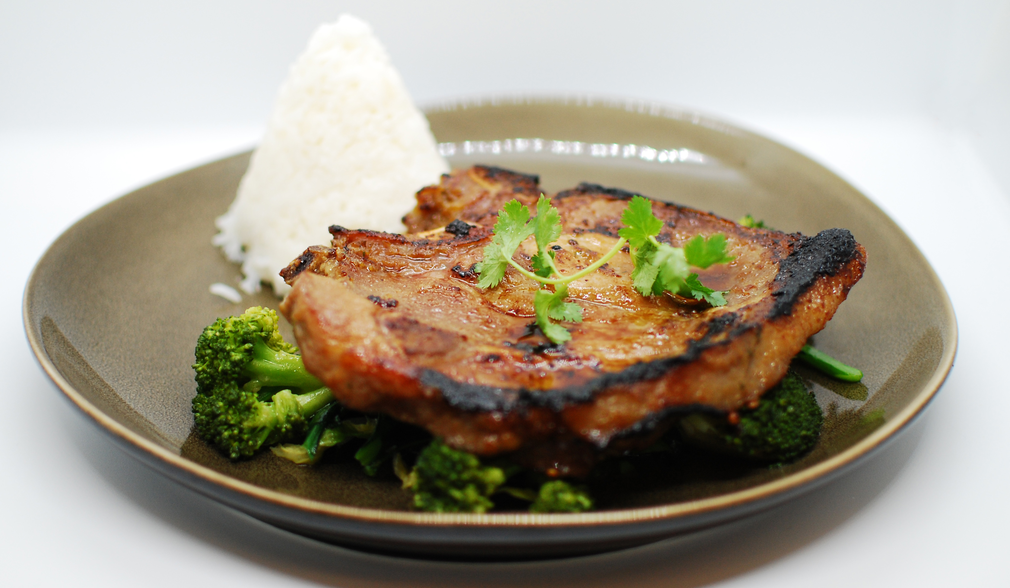 Order Grilled Aged Pork Chop Lunch Special food online from Spice thai store, New York on bringmethat.com
