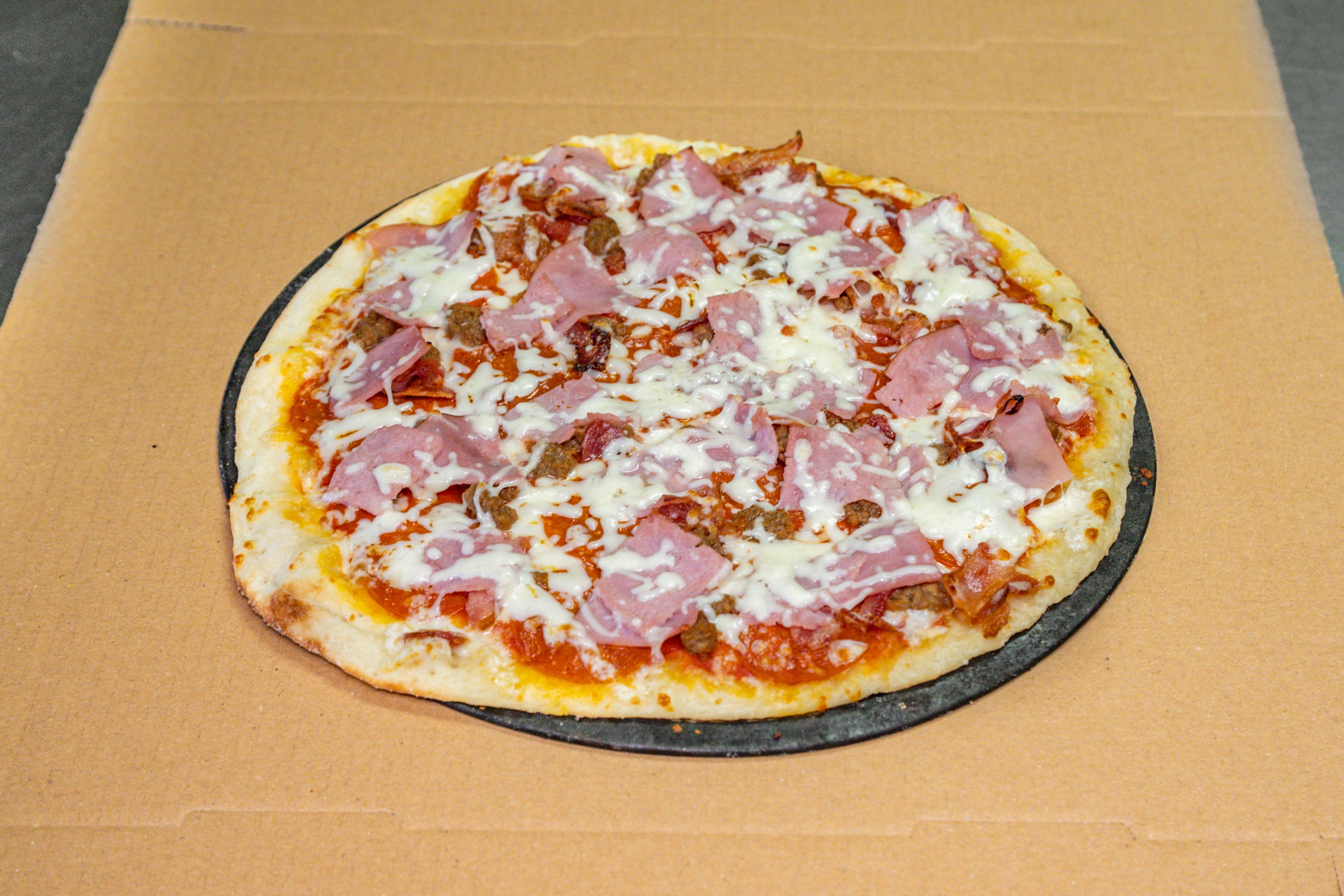 Order Meat Lover's Pizza - Large 14'' food online from Venice Pizzeria store, Santa Clarita on bringmethat.com