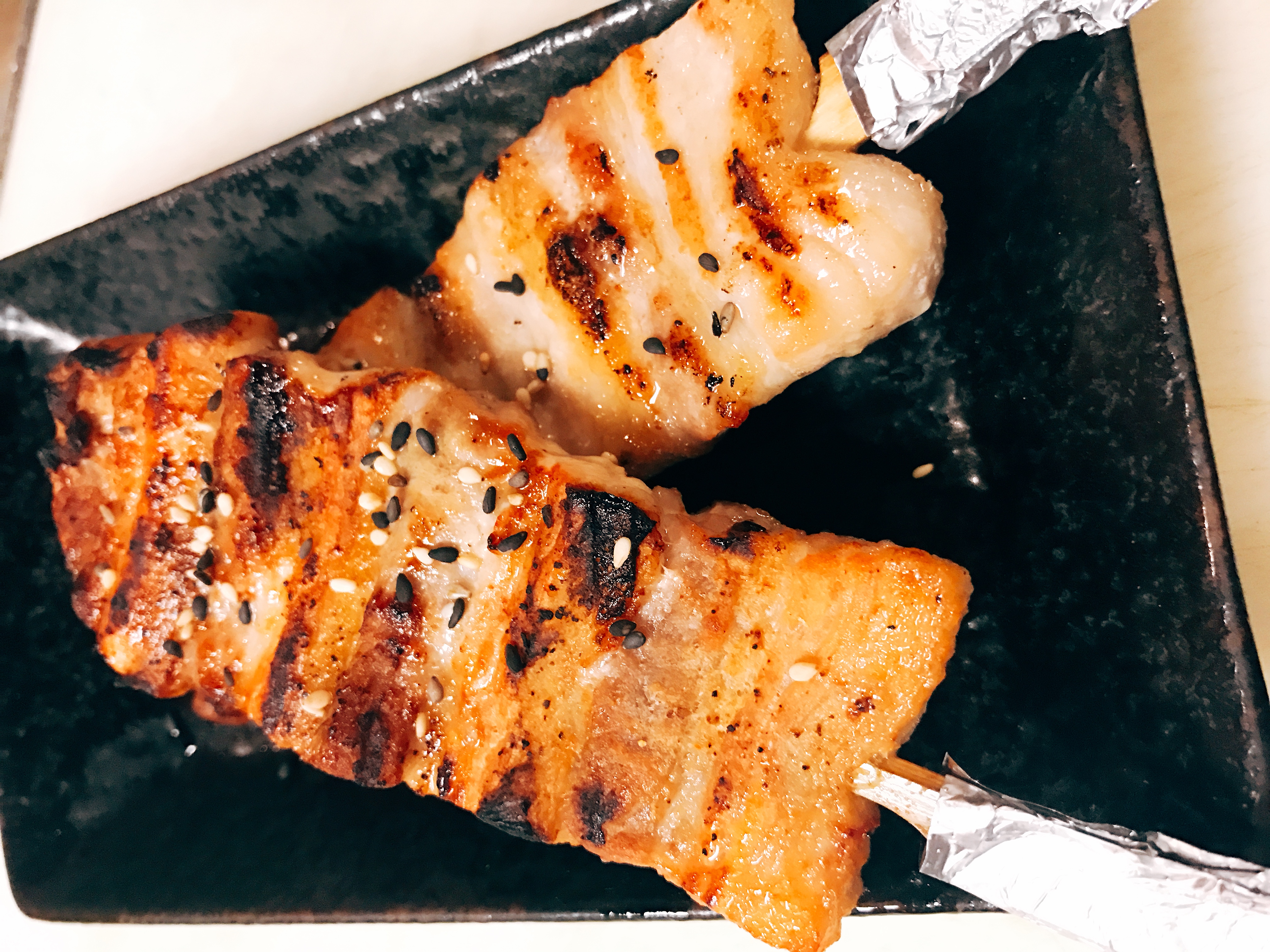 Order Pork Belly Yakitori food online from Naked Fish Japanese Restaurant store, Chino Hills on bringmethat.com