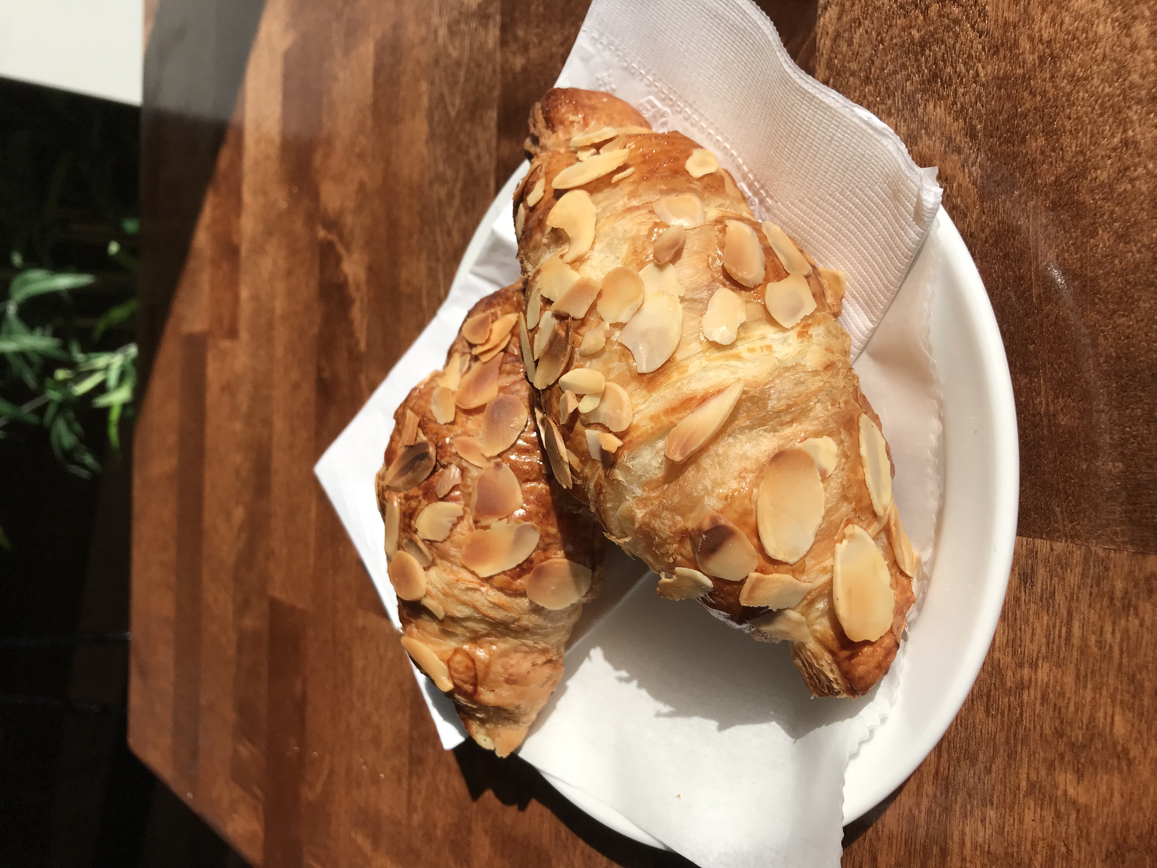 Order Almond Croissant  food online from Klein's Bakery And Cafe store, Chicago on bringmethat.com