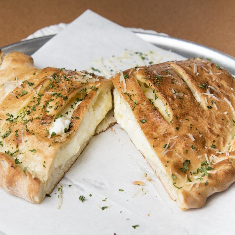 Order Calzone - Individual food online from Brothers Pizza store, Las Vegas on bringmethat.com