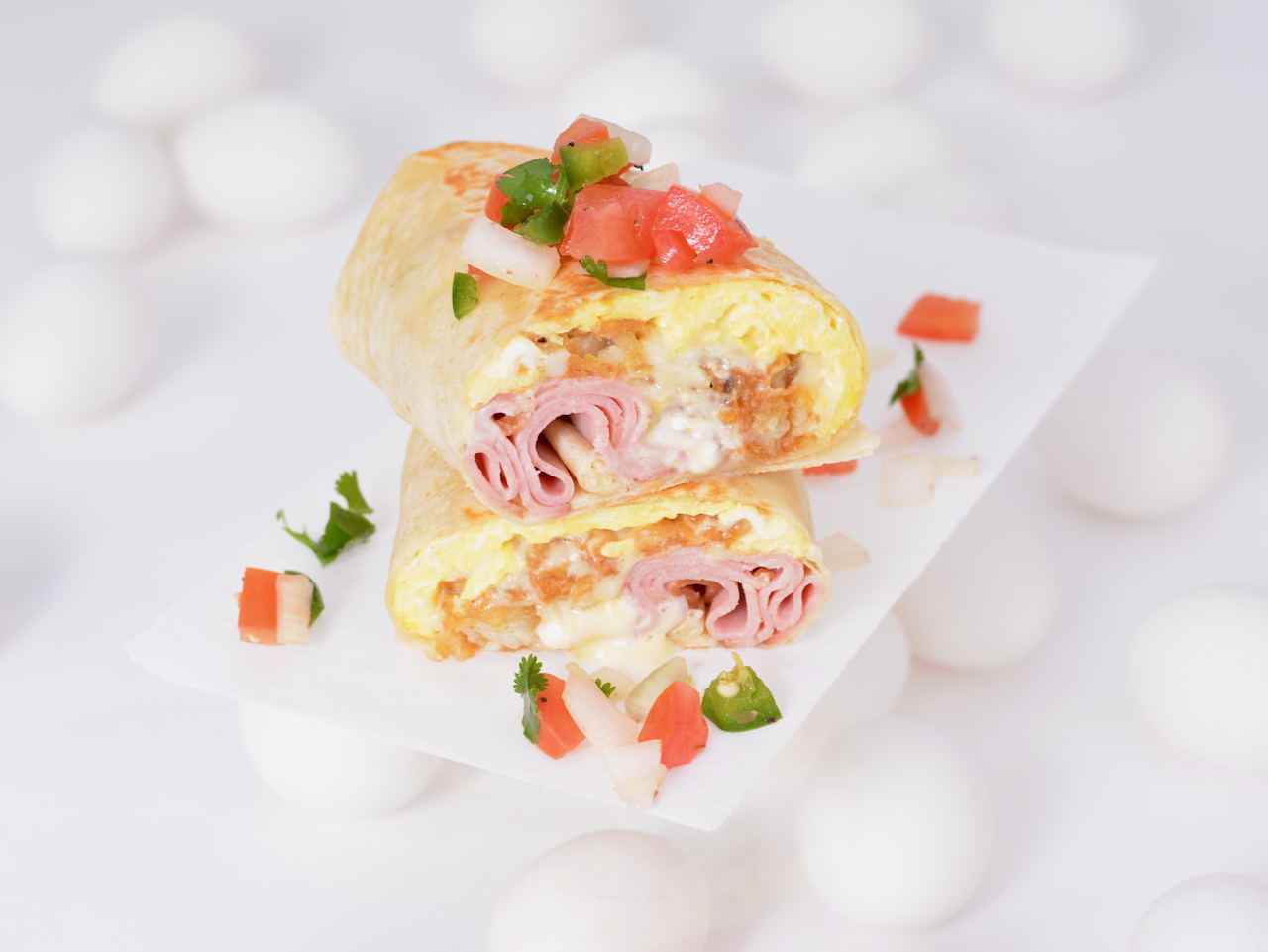 Order Honey Smoked Ham, Egg and Swiss Burrito  food online from Breakfast Town store, Troy on bringmethat.com