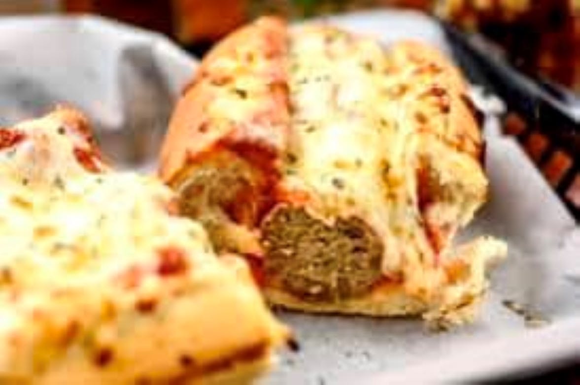 Order Meatball & Cheese Sub - Oven Baked Subs food online from Knolla's Pizza store, Wichita on bringmethat.com