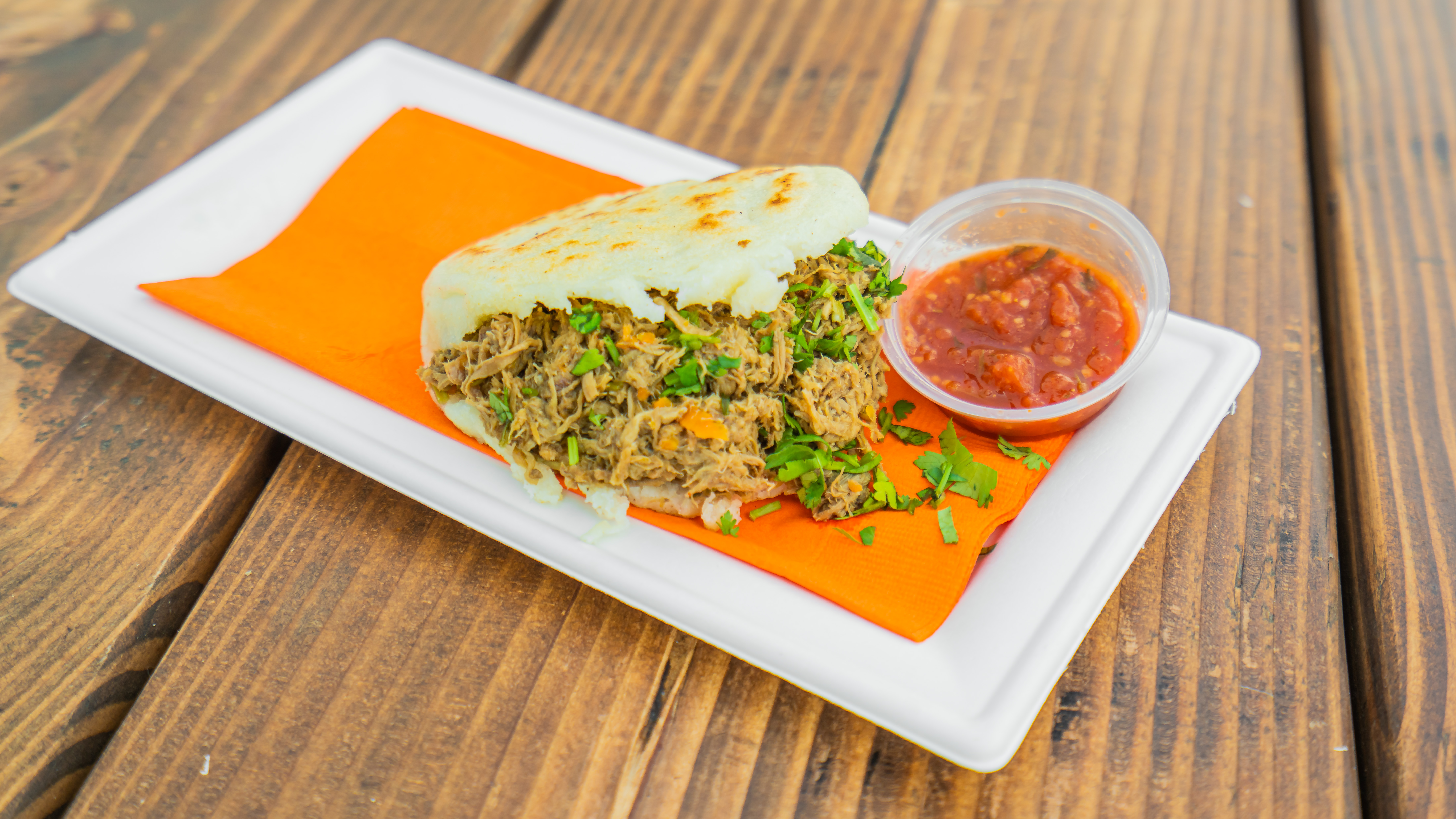 Order Shredded Beef Arepa food online from Cacho Bistro store, Albuquerque on bringmethat.com