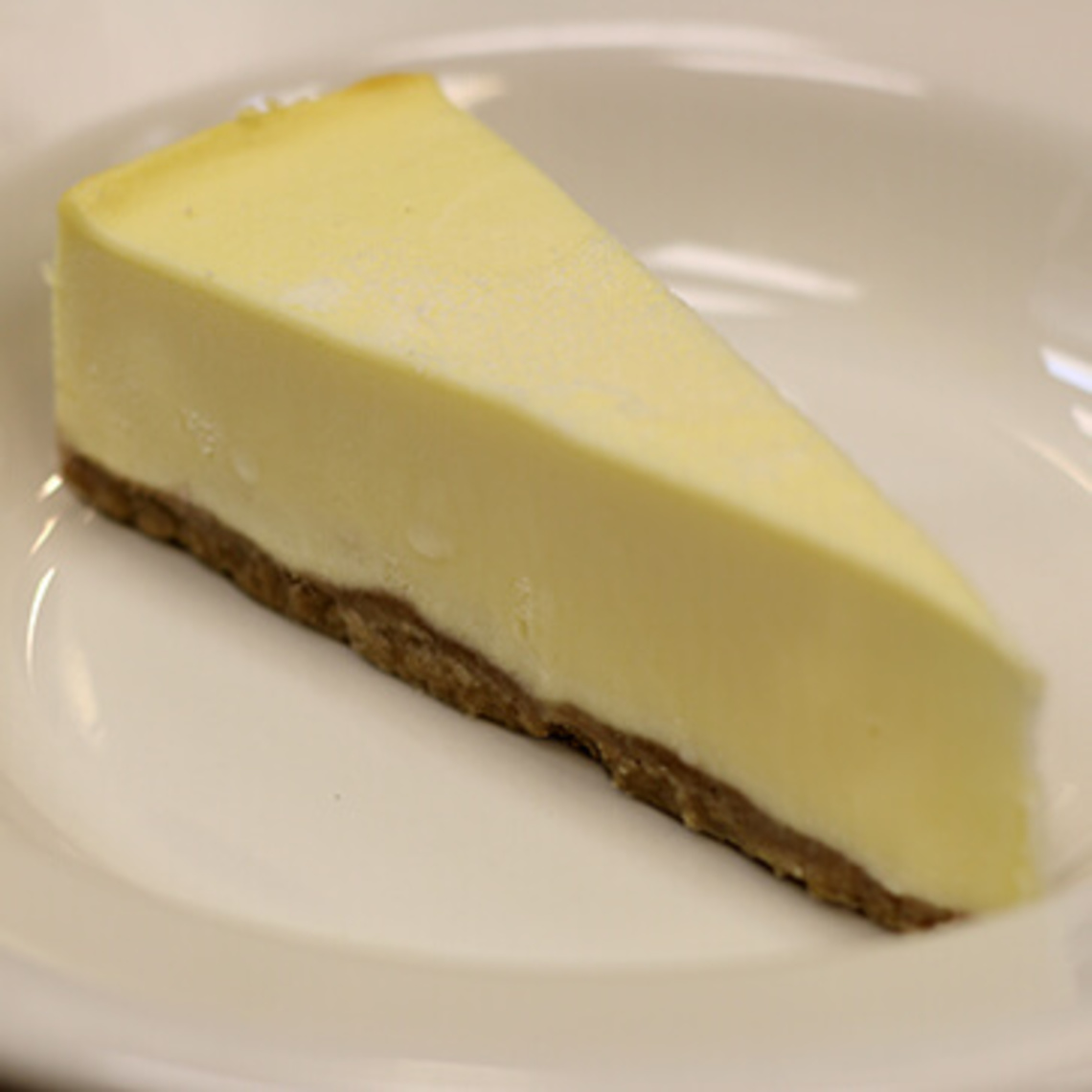 Order Cheesecake food online from Mario's Pizza store, Winston Salem on bringmethat.com