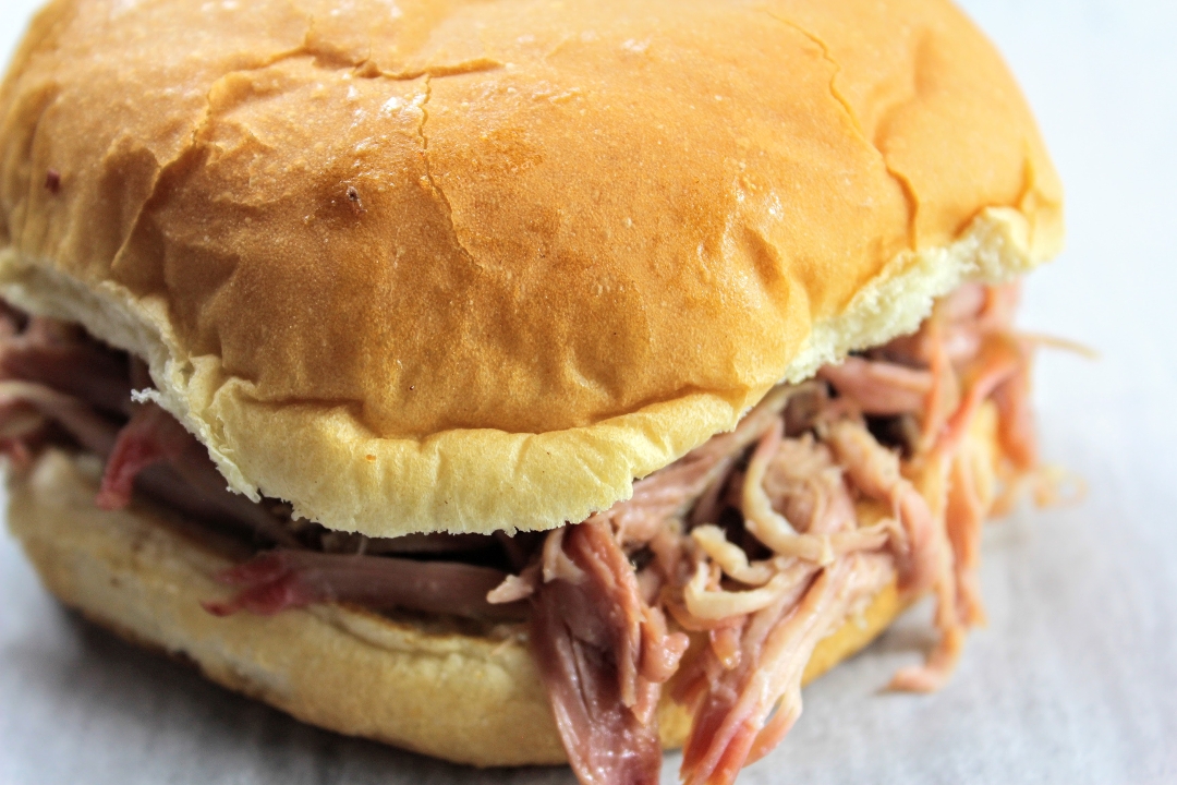 Order Pulled Pork Sandwich food online from Mckenzie Barbeque store, Montgomery on bringmethat.com