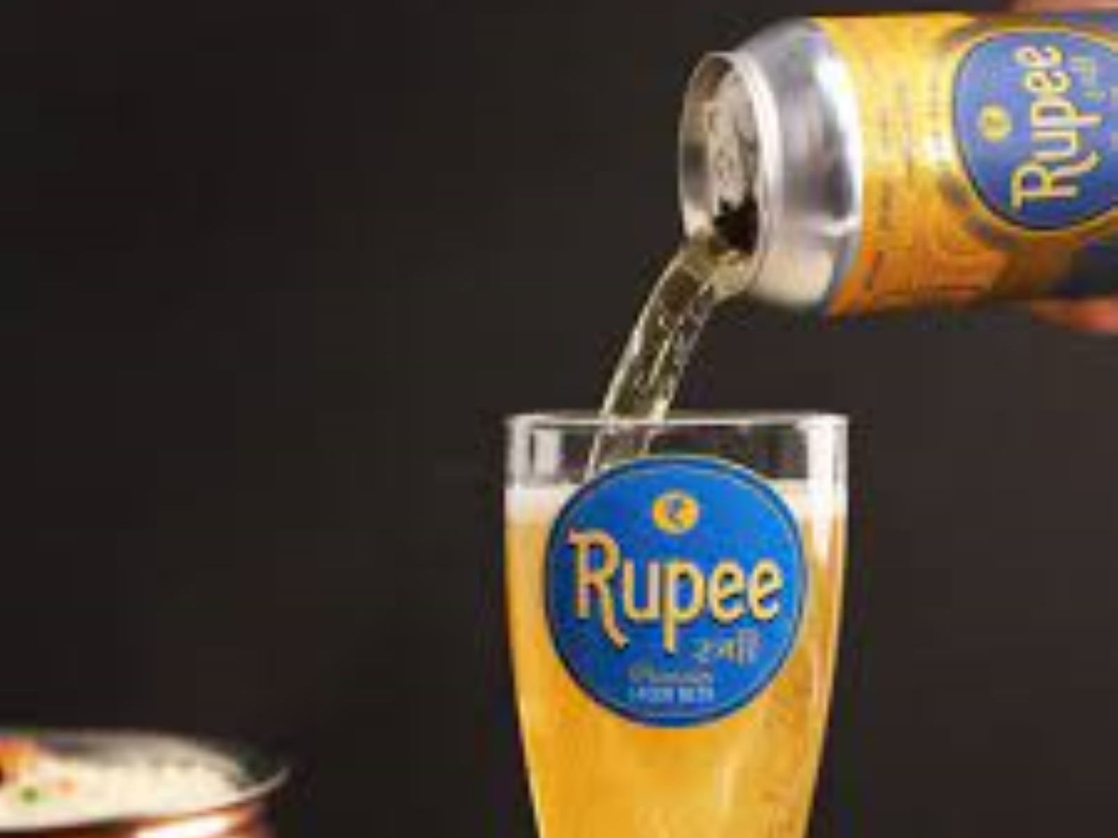 Order Rupee Lager Beer food online from Passage to India store, Cambridge on bringmethat.com