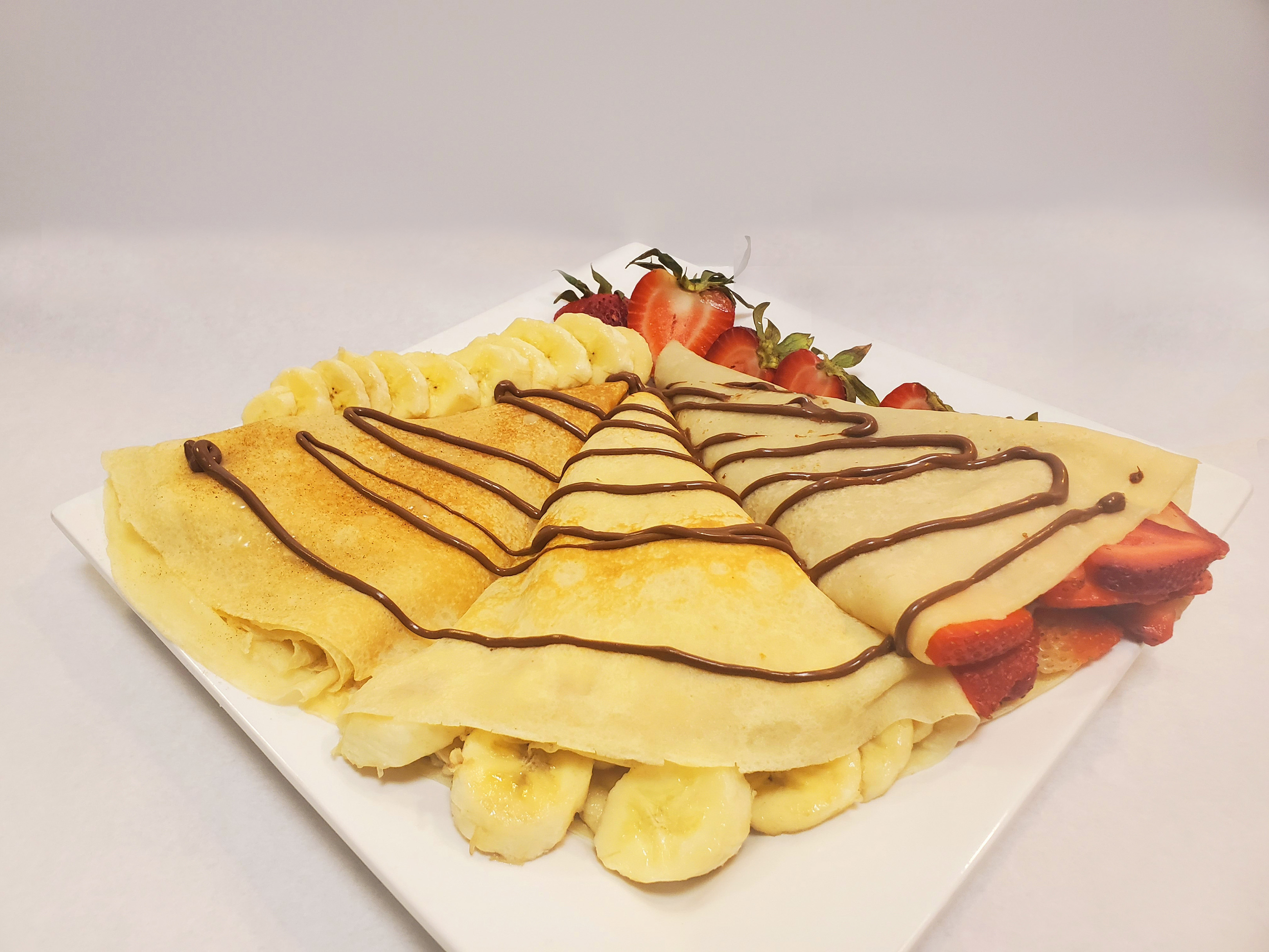 Order 8. Strawberry, Banana and Nutella Crepe food online from Aunty Cafe store, Appleton on bringmethat.com