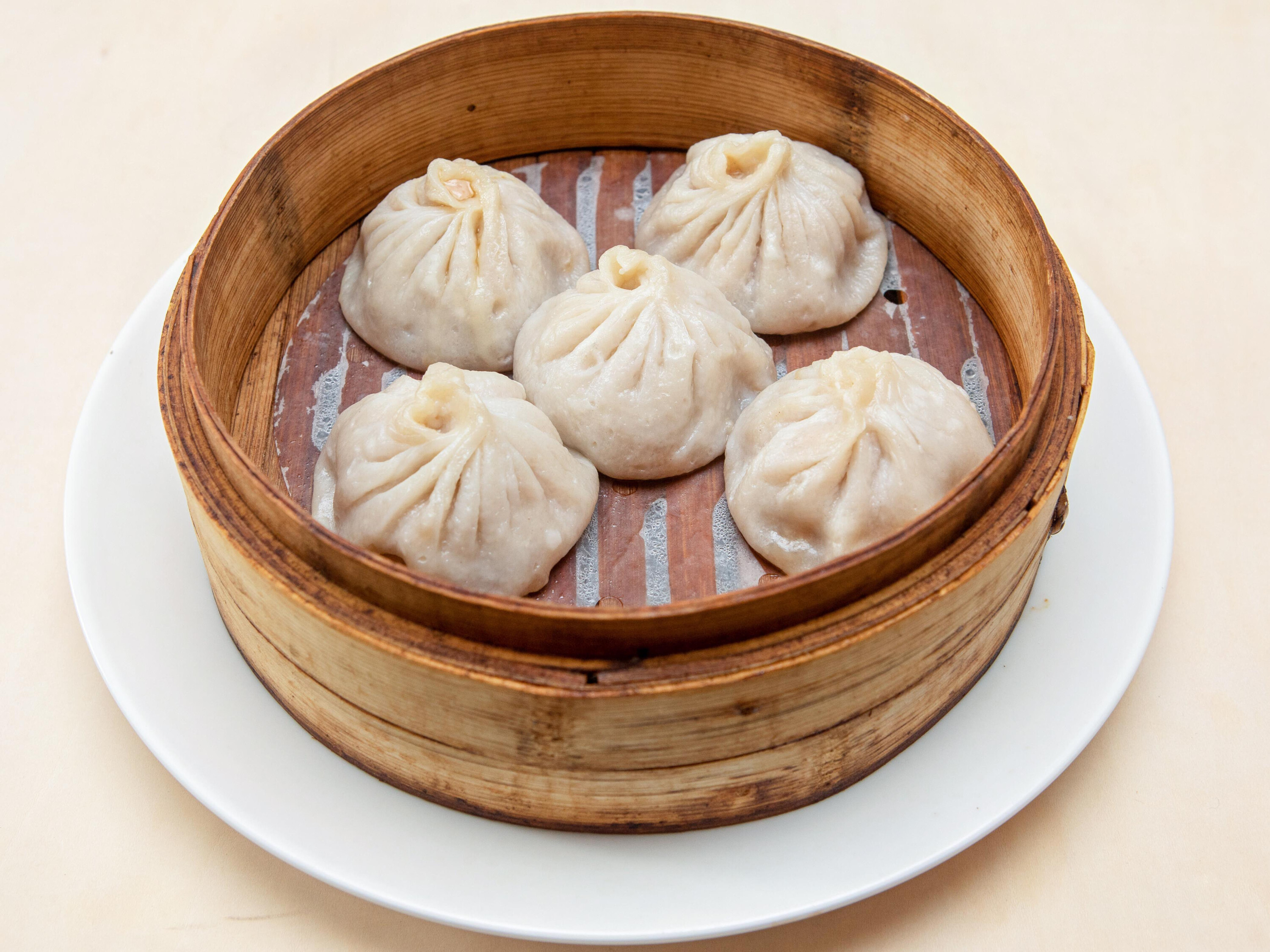 Order Shanghai pork Soup Dumplings food online from Eddy's Traditional Chinese Cooking store, Clifton Park on bringmethat.com