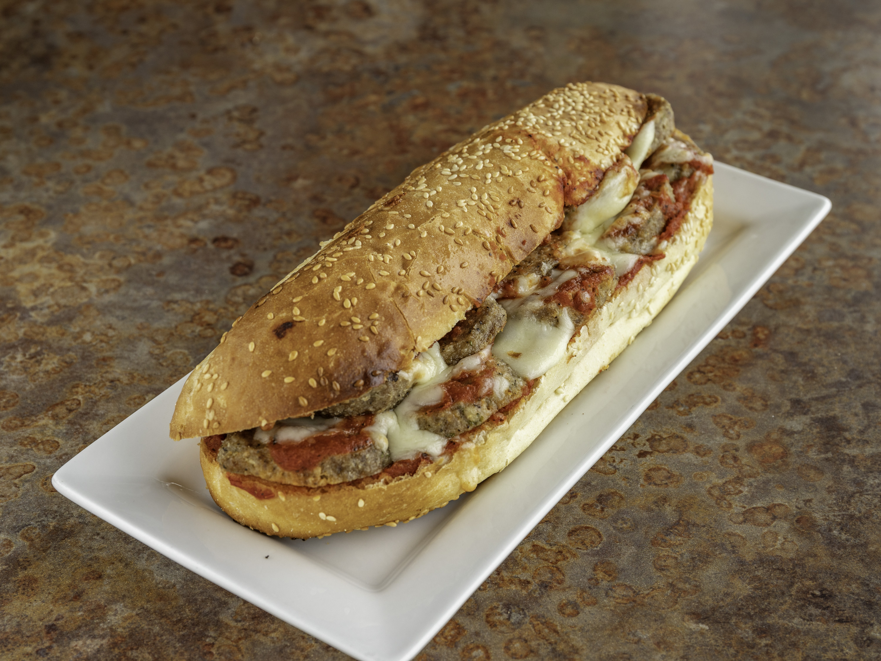 Order Sausage  Sub  food online from Carmelos Italian Pizza store, Caledonia on bringmethat.com