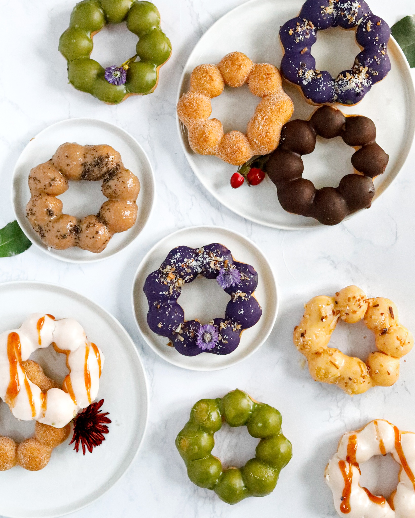 Order 12 pack donuts food online from Hookt Doughnuts store, San Francisco on bringmethat.com