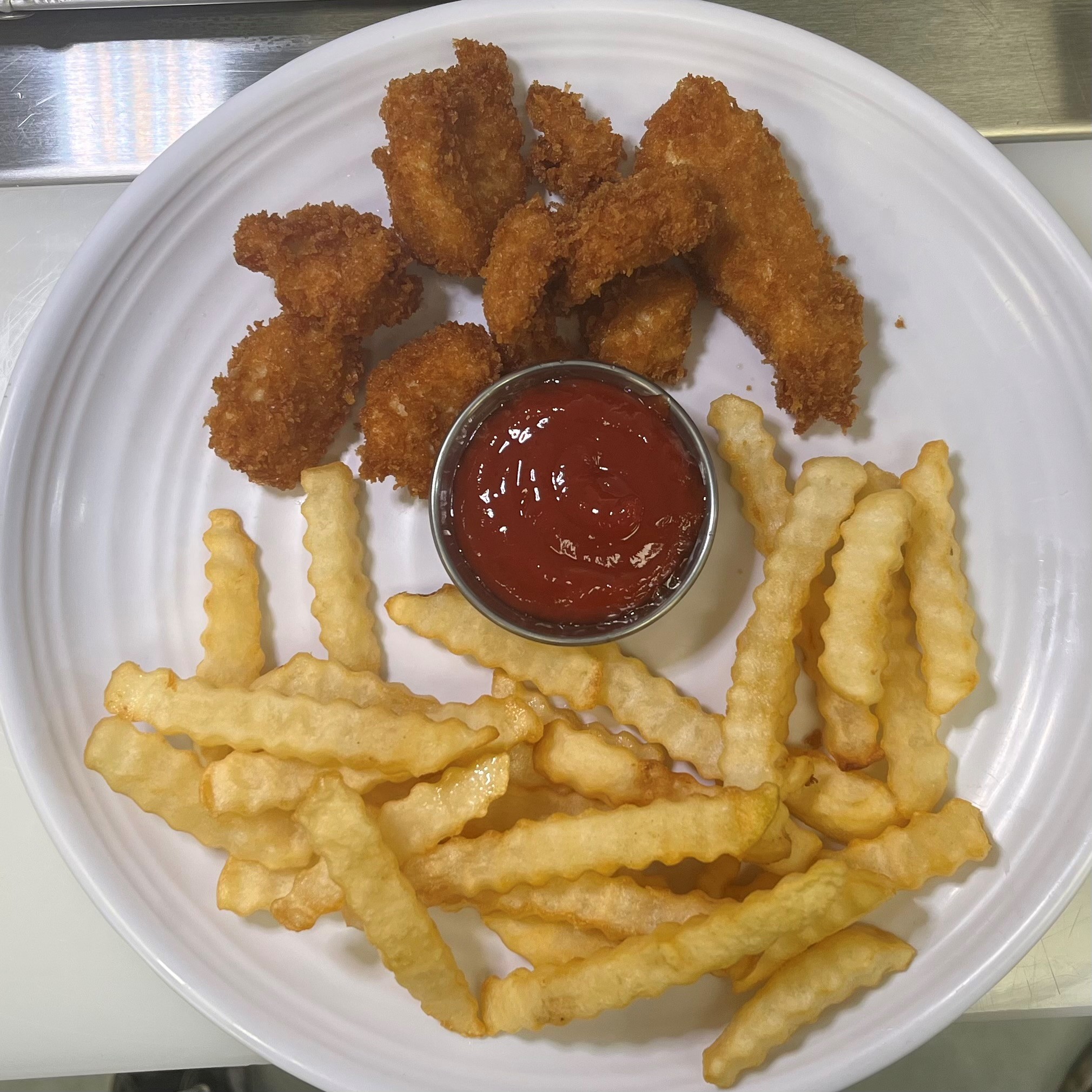 Order Kids Classic Chicken Nuggets and French Fries food online from Rock-N-Roll Sushi store, Trussville on bringmethat.com