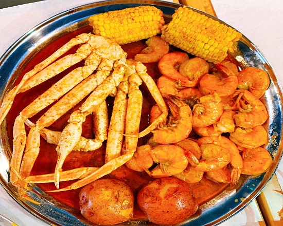 Order Combo C food online from Juicy Seafood store, Evansville on bringmethat.com