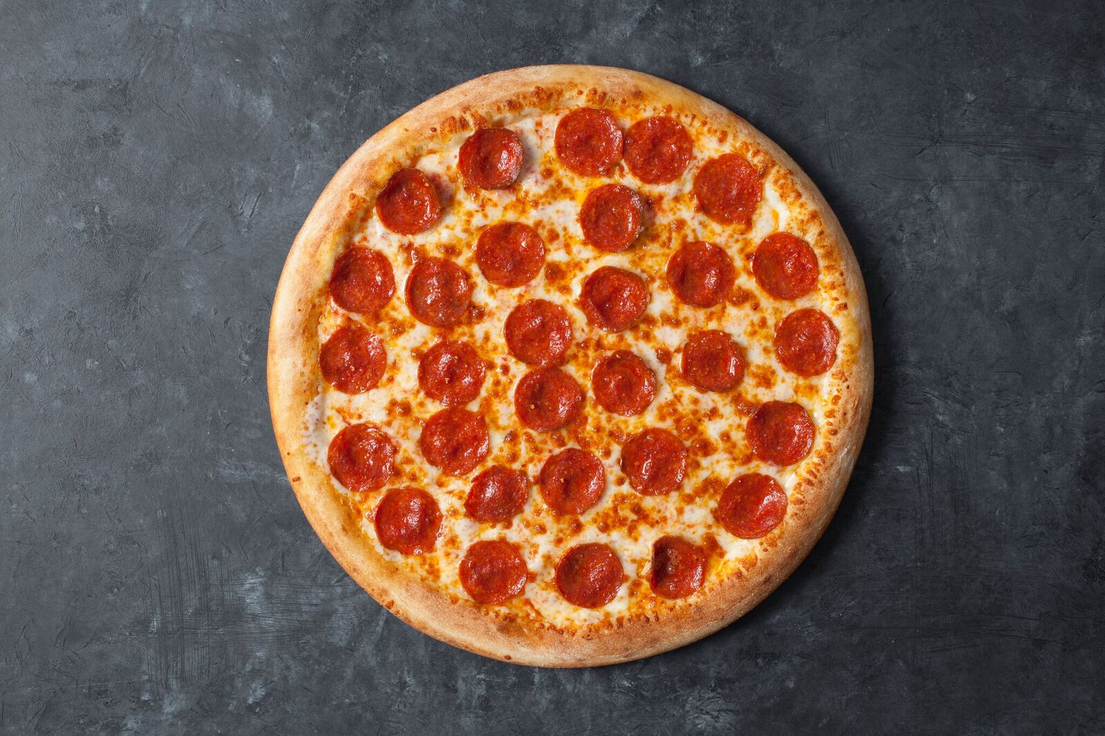 Order Pepperoni Pizza - Large 14" (8 slices) food online from Pizza Fuego store, San Bernardino on bringmethat.com
