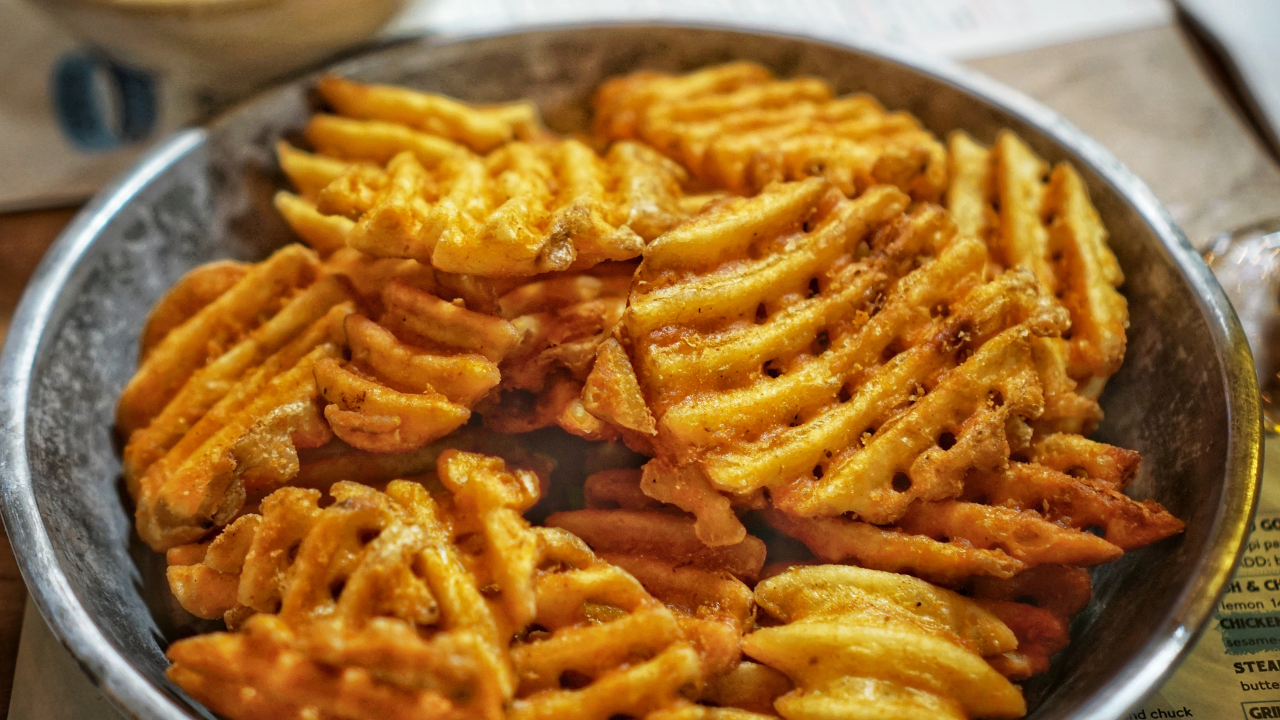 Order Waffle Fries food online from First Down Sports Bar & Grill store, Arlington on bringmethat.com