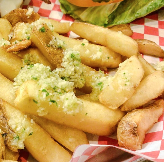 Order Garlic Fries food online from Big Mouth Burgers store, San Bruno on bringmethat.com
