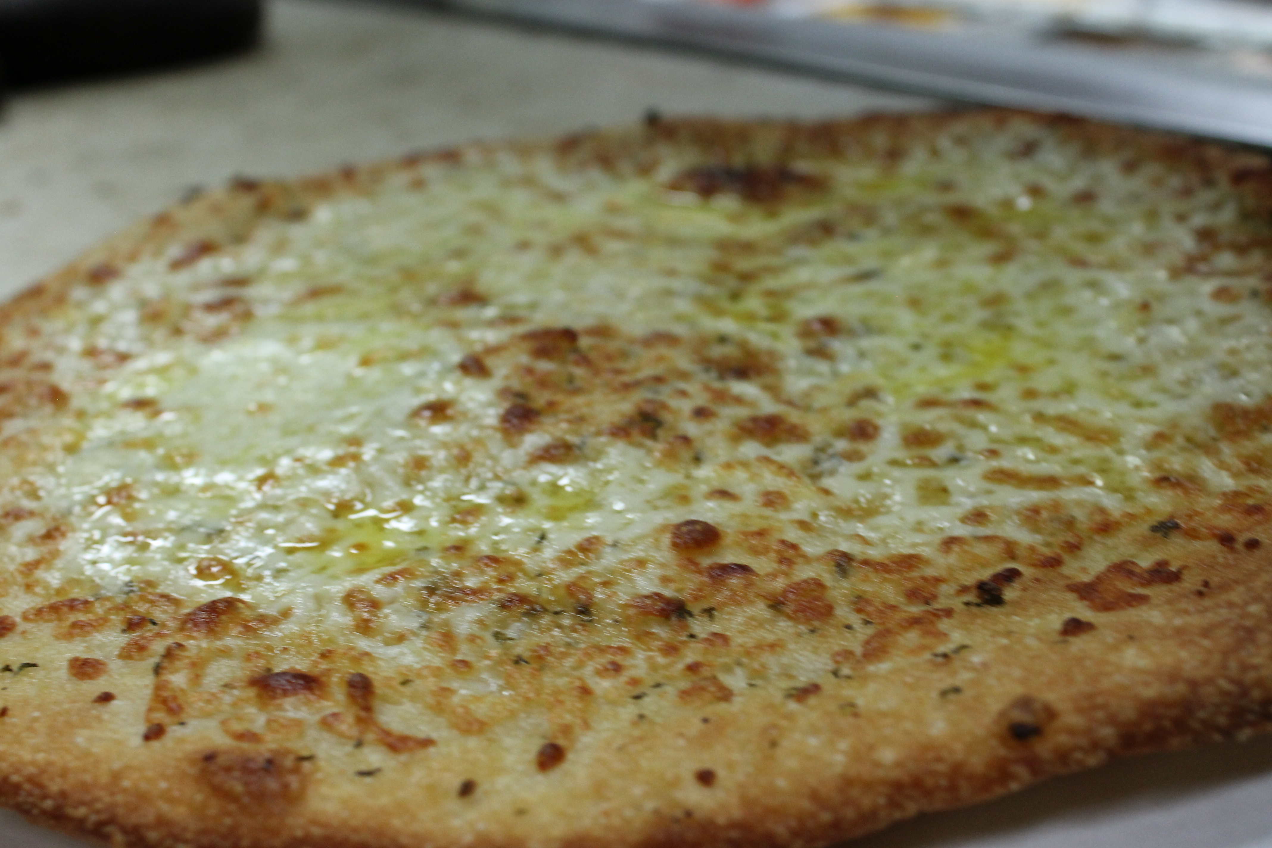 Order Cheesy Breadsticks food online from Bellacino's Pizza & Grinders store, Keego Harbor on bringmethat.com