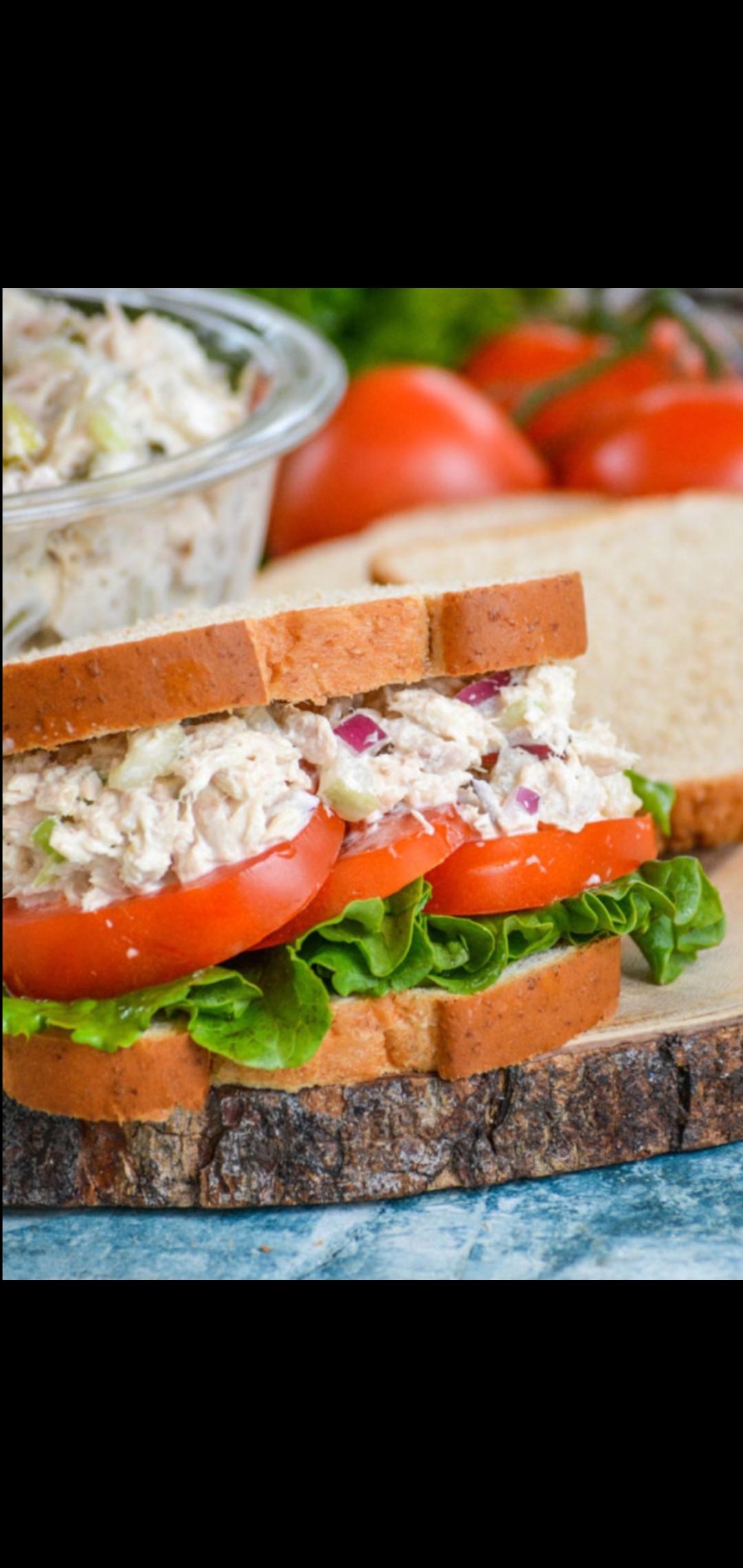 Order  Classic Tuna Salad Special Sandwich (tuna salad red onions pickles tomatoes lettuce) food online from American Gourmet Foods Deli store, New York on bringmethat.com