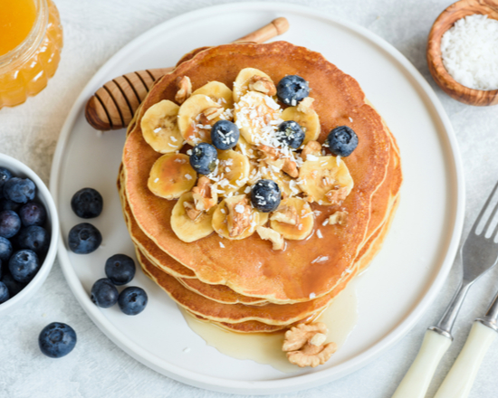 Order Banana and Blueberry Pancakes food online from Breakfast Snob store, San Francisco on bringmethat.com