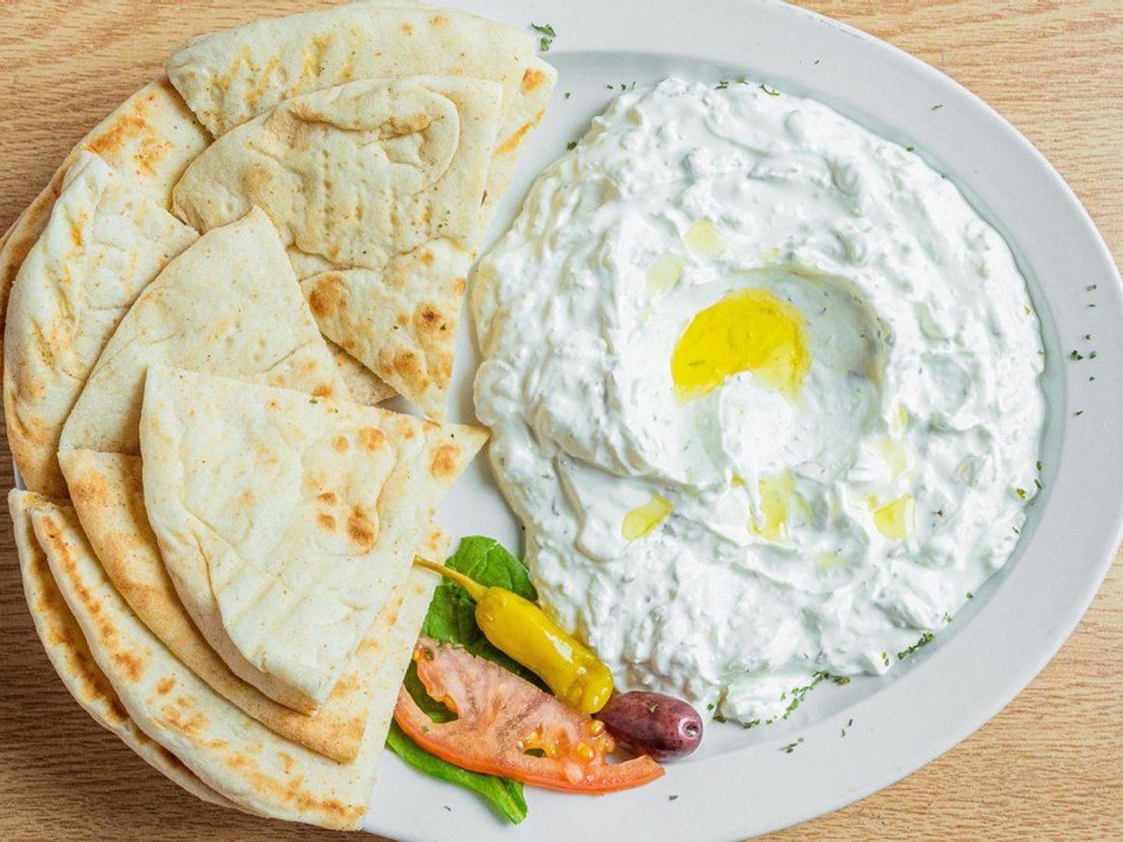 Order Tzatziki food online from Olympia Grill store, Getzville on bringmethat.com
