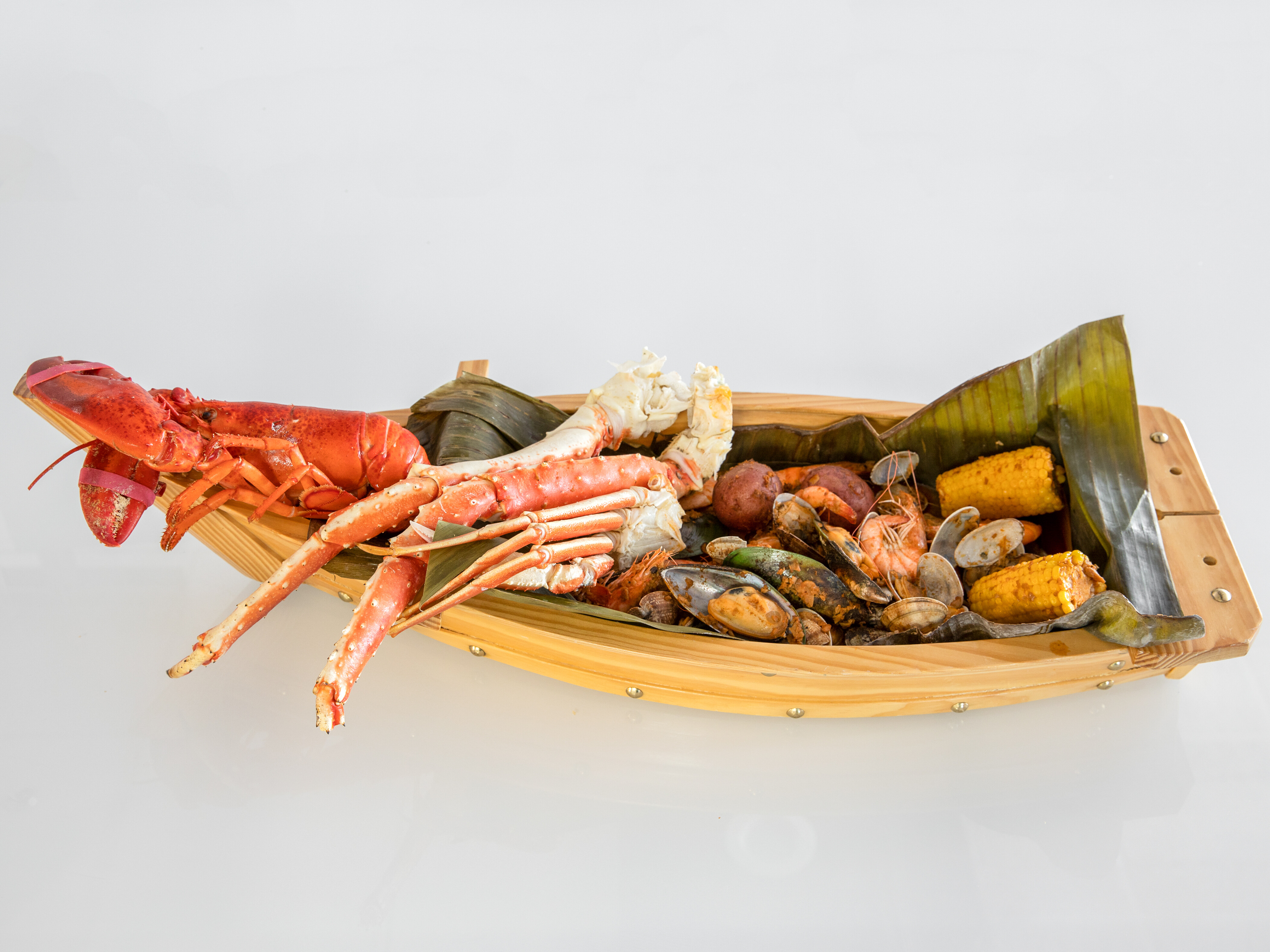 Order Large Seafood Boat food online from The Dancing Crabs store, Chino on bringmethat.com