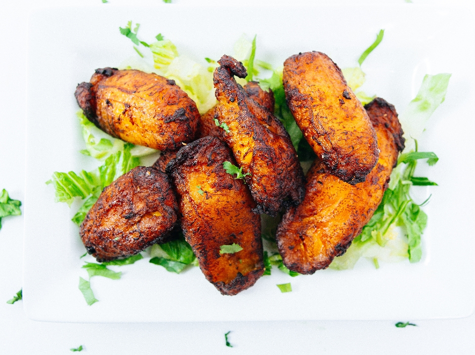 Order Sweet Plantains food online from Afro Deli store, Minneapolis on bringmethat.com