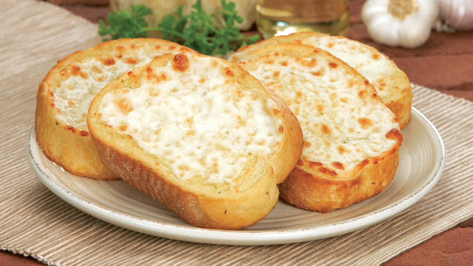 Order Garlic Bread with Cheese food online from Godfathers Pizza store, Cedar Rapids on bringmethat.com