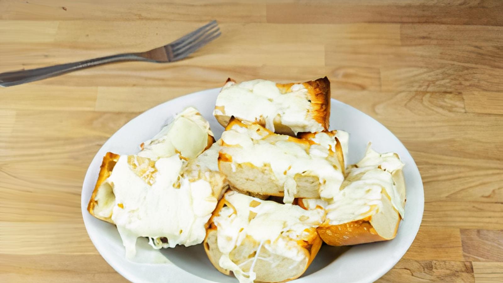 Order Garlic Cheese Bread food online from Toto's Pizzeria & Restaurant store, Belmont on bringmethat.com