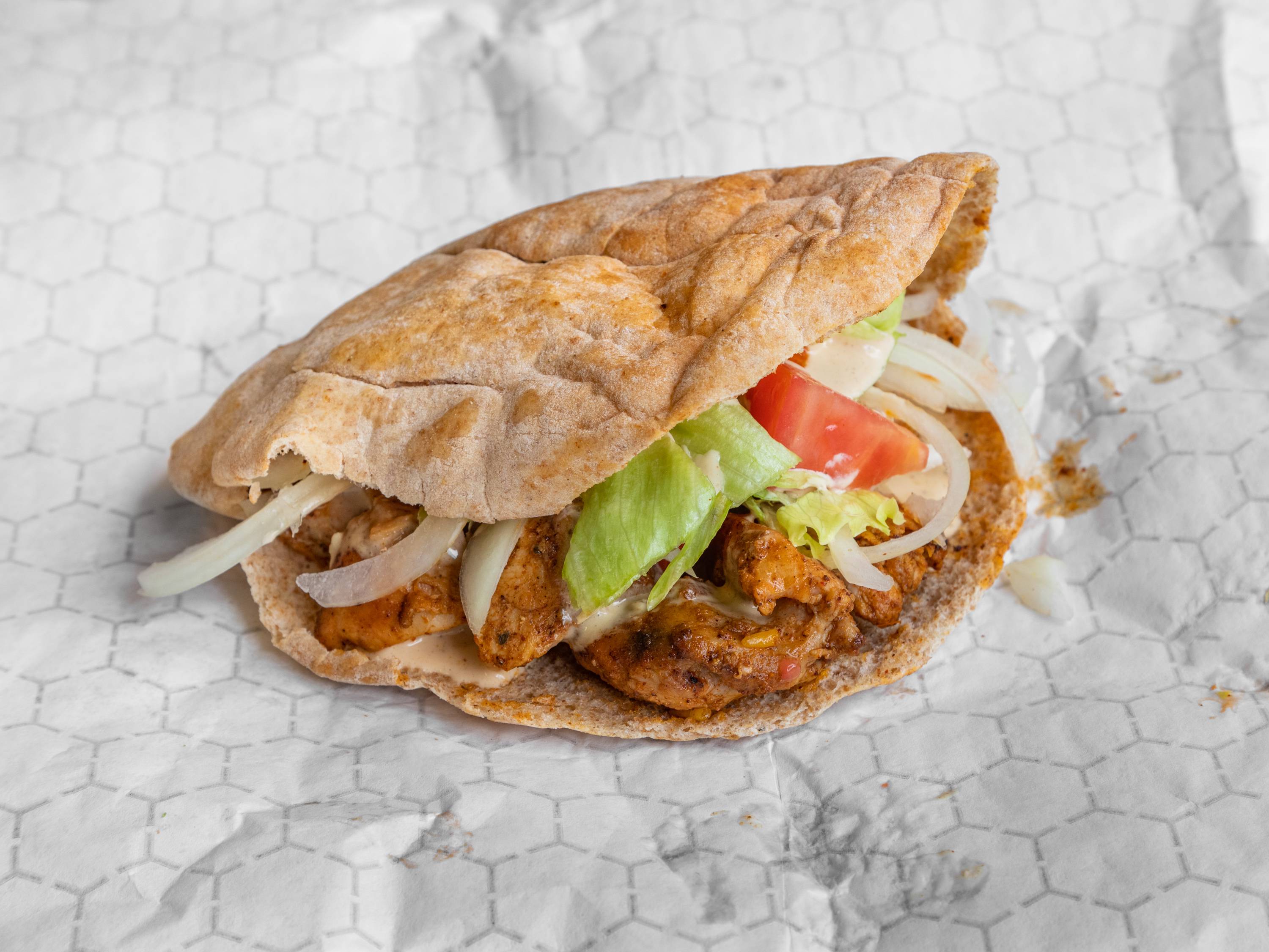 Order Chicken shawarma sandwich food online from Mo Grill And Sweets store, Somerville on bringmethat.com
