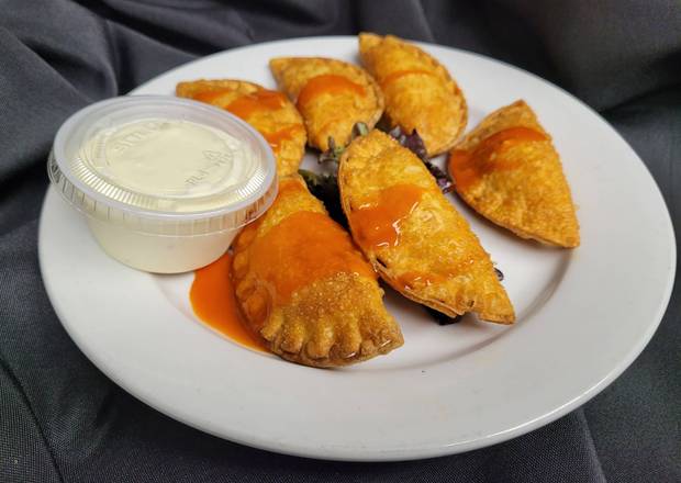 Order Buffalo Chicken Wontons food online from Cooper Cave Ale Company store, Glens Falls on bringmethat.com