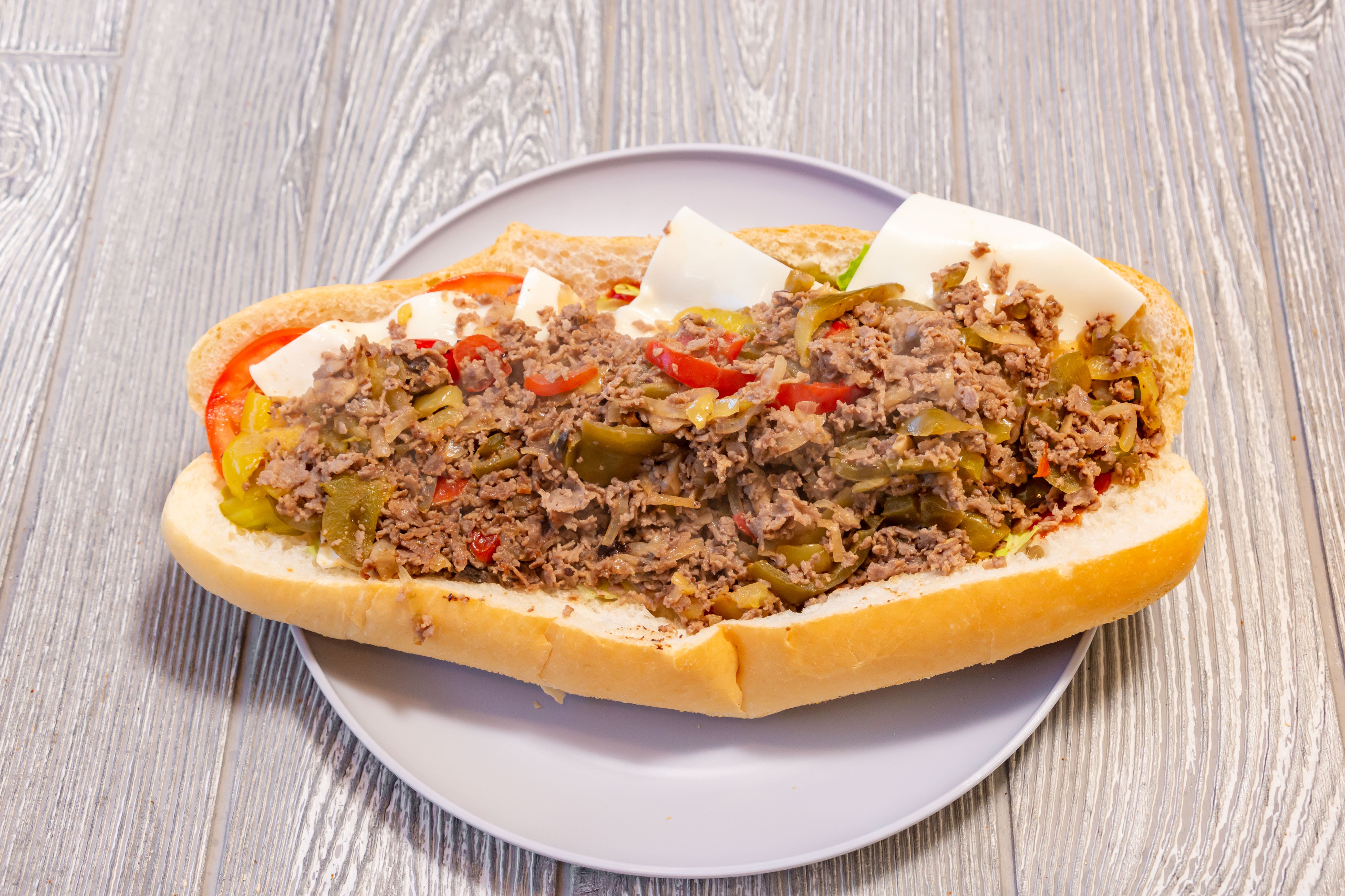 Order Cheese Steak Deluxe Sandwich - Small 9" food online from Gianni Pizza store, Wilmington on bringmethat.com