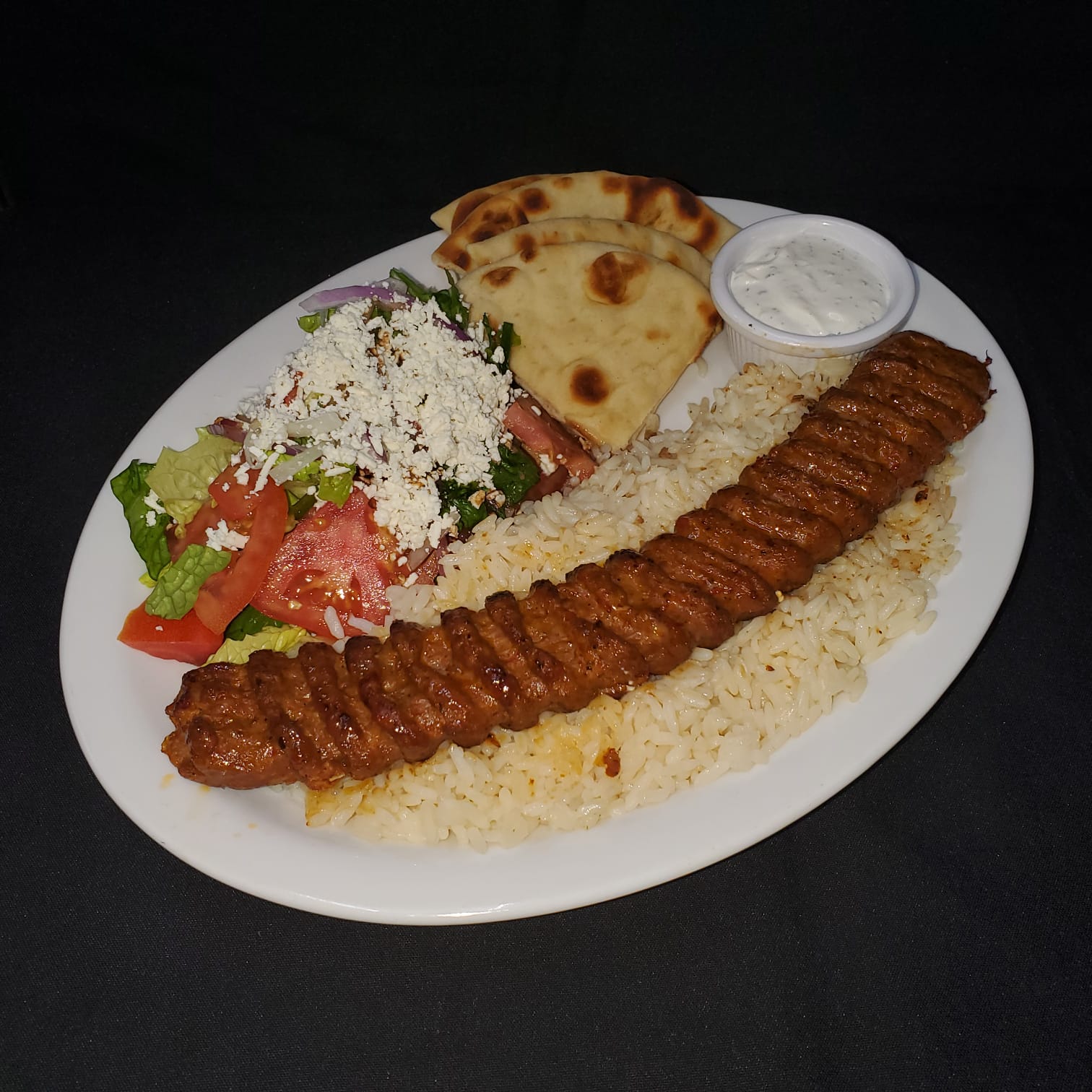 Order Adana Kebab food online from Cafe Agora store, Atlanta on bringmethat.com