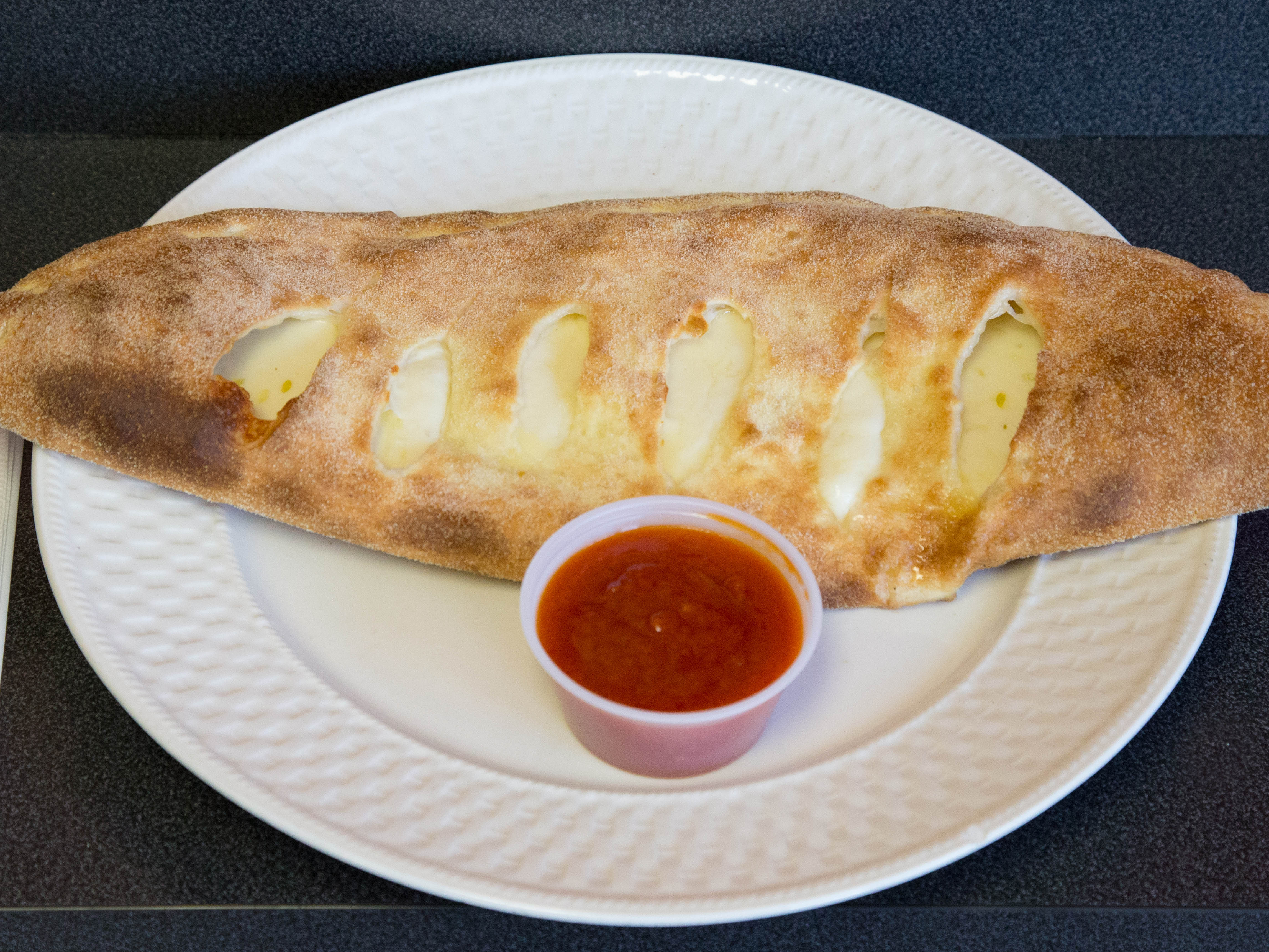 Order Cheese Calzone L.G. food online from Italian Pizza & Subs store, Jamaica Plain on bringmethat.com