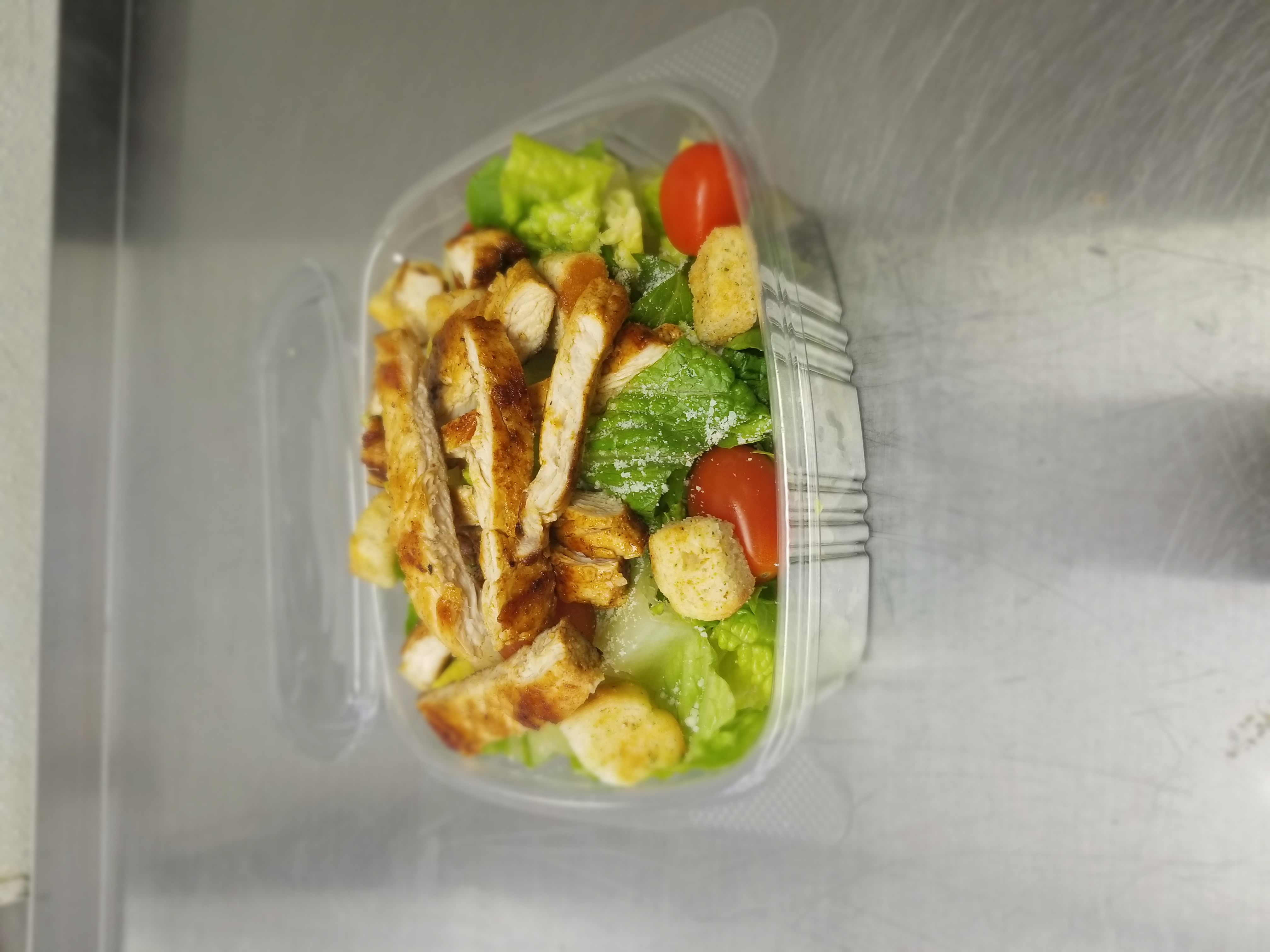 Order Caesar Salad with Chicken food online from Panaro's Pizzeria store, Bridgeport on bringmethat.com