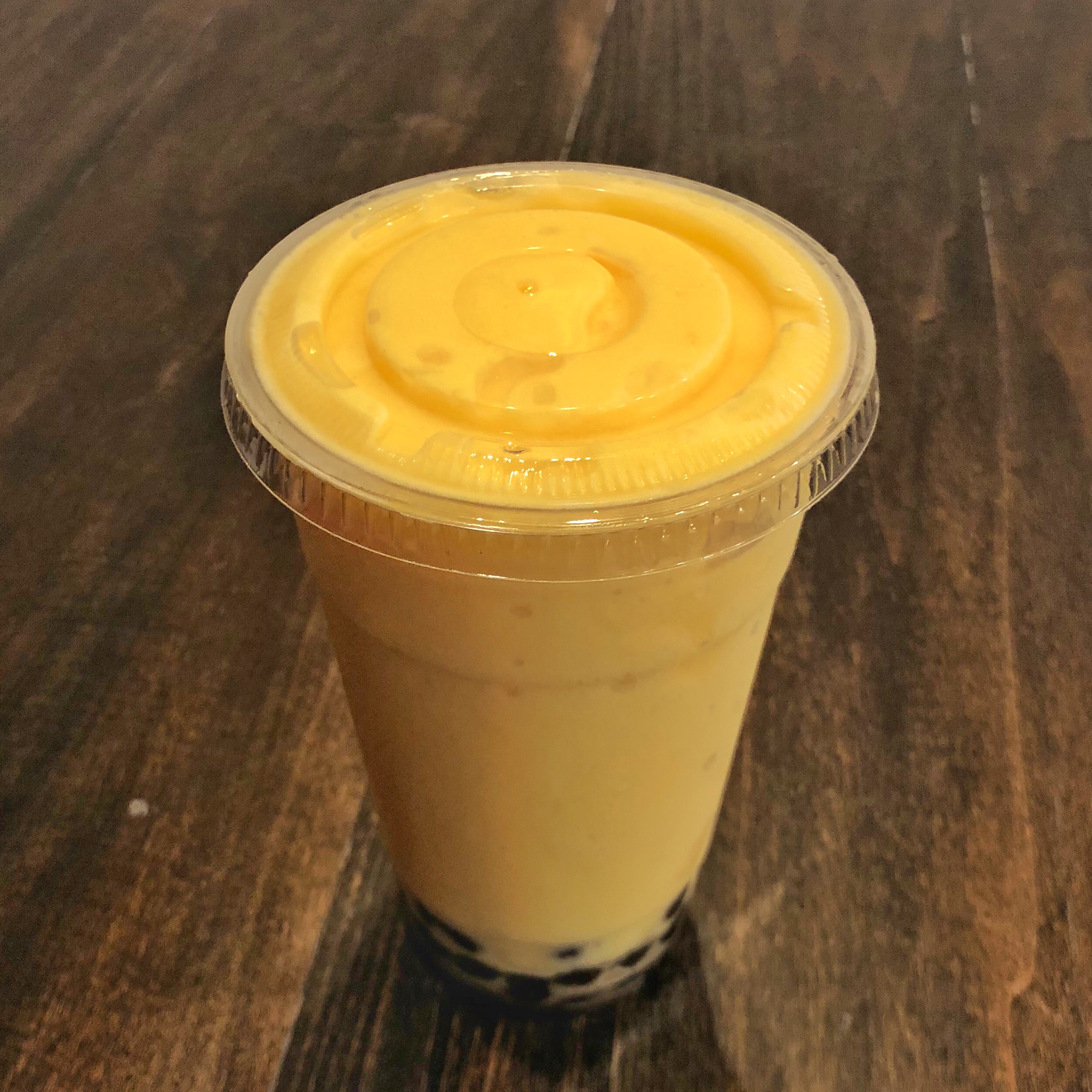 Order Passion Fruit Smoothie food online from Isshin Ramen & Boba store, Los Angeles on bringmethat.com
