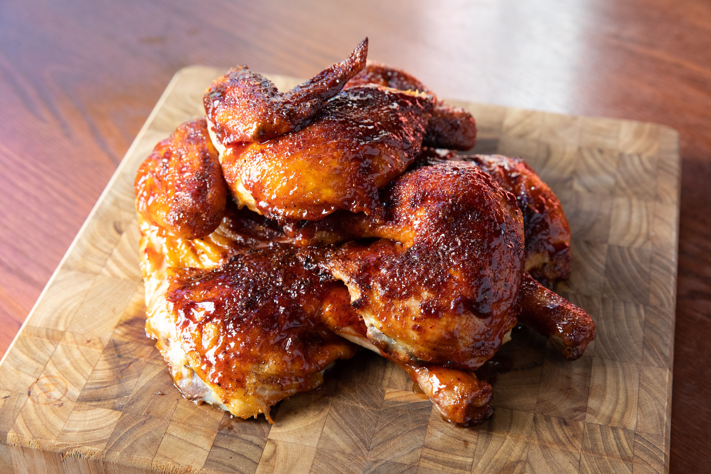 Order 2055. BBQ Chicken 1/2 food online from Smokey Bones Barbeque and Grill store, Mentor on bringmethat.com