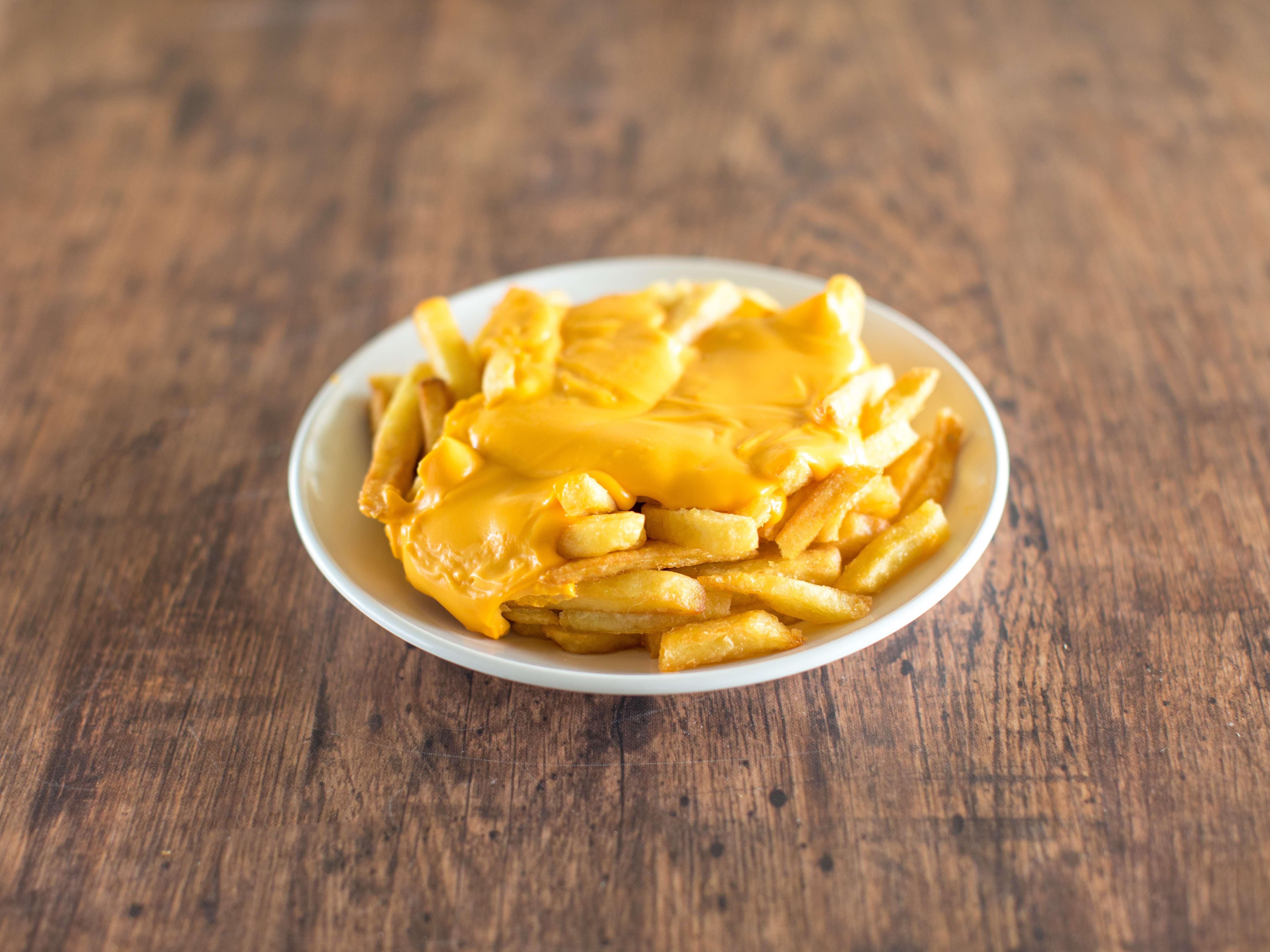 Order Cheese Fries food online from Valentino's Italian Pizzeria store, Richmond on bringmethat.com
