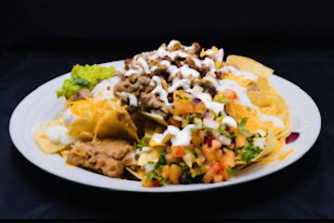 Order Carne asada nachos supreme food online from Salsitas store, Phoenix on bringmethat.com