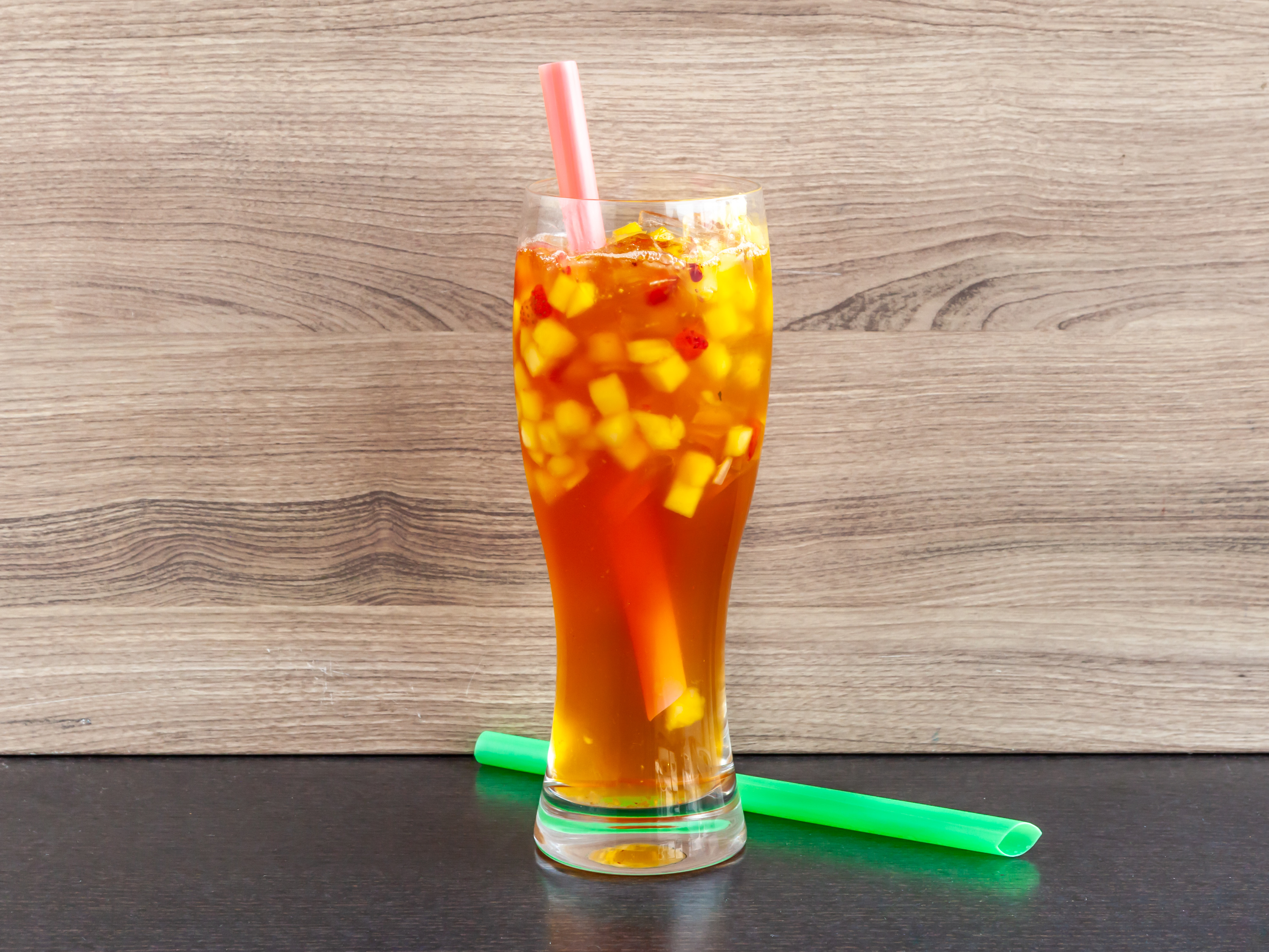 Order Guava Passion Fruit Iced Tea food online from Dc Donut Cafe store, Granada Hills on bringmethat.com