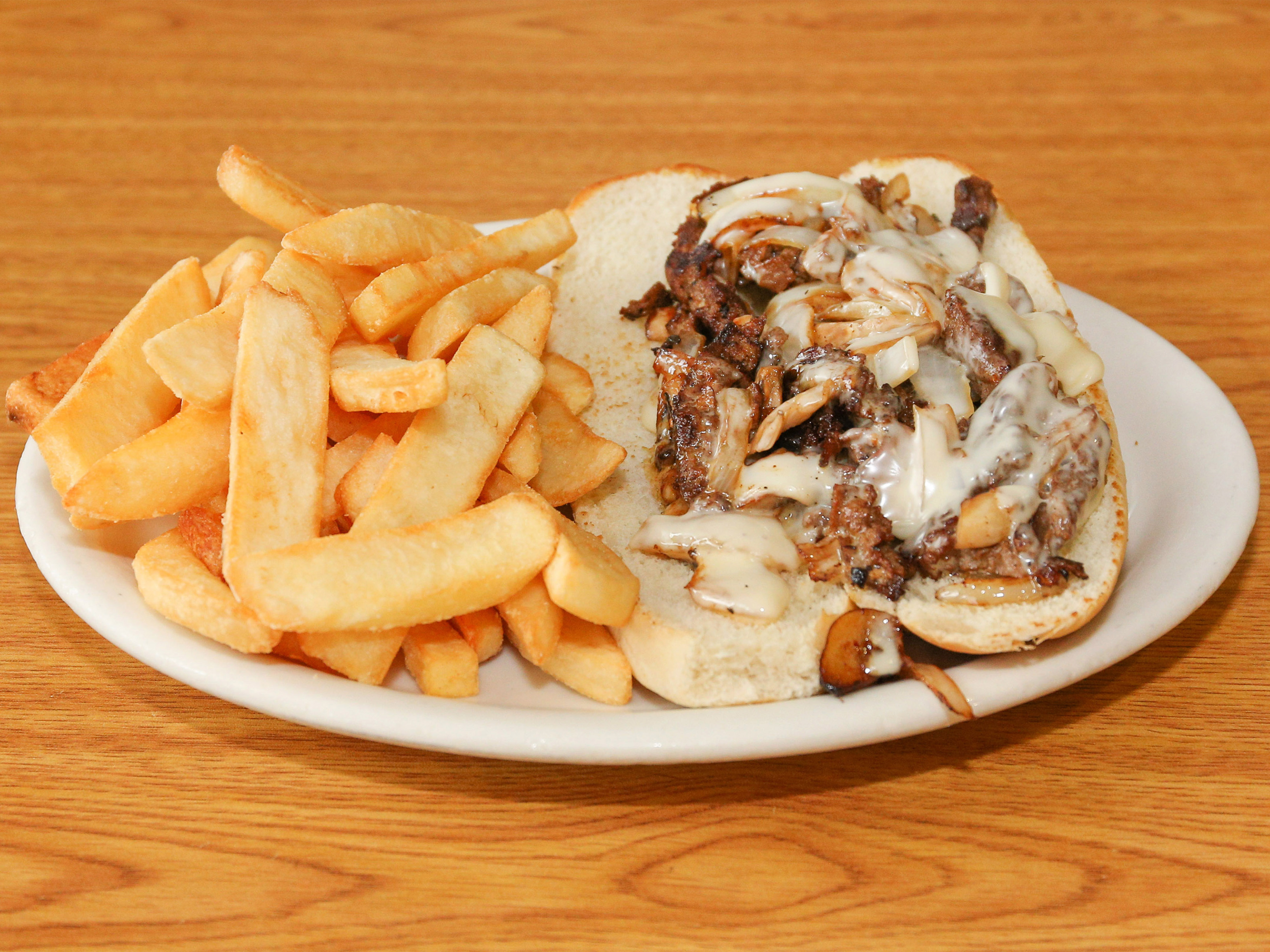 Order Philly Steak with Onion and Mushroom food online from Peanuts Deluxe Cafe store, San Jose on bringmethat.com