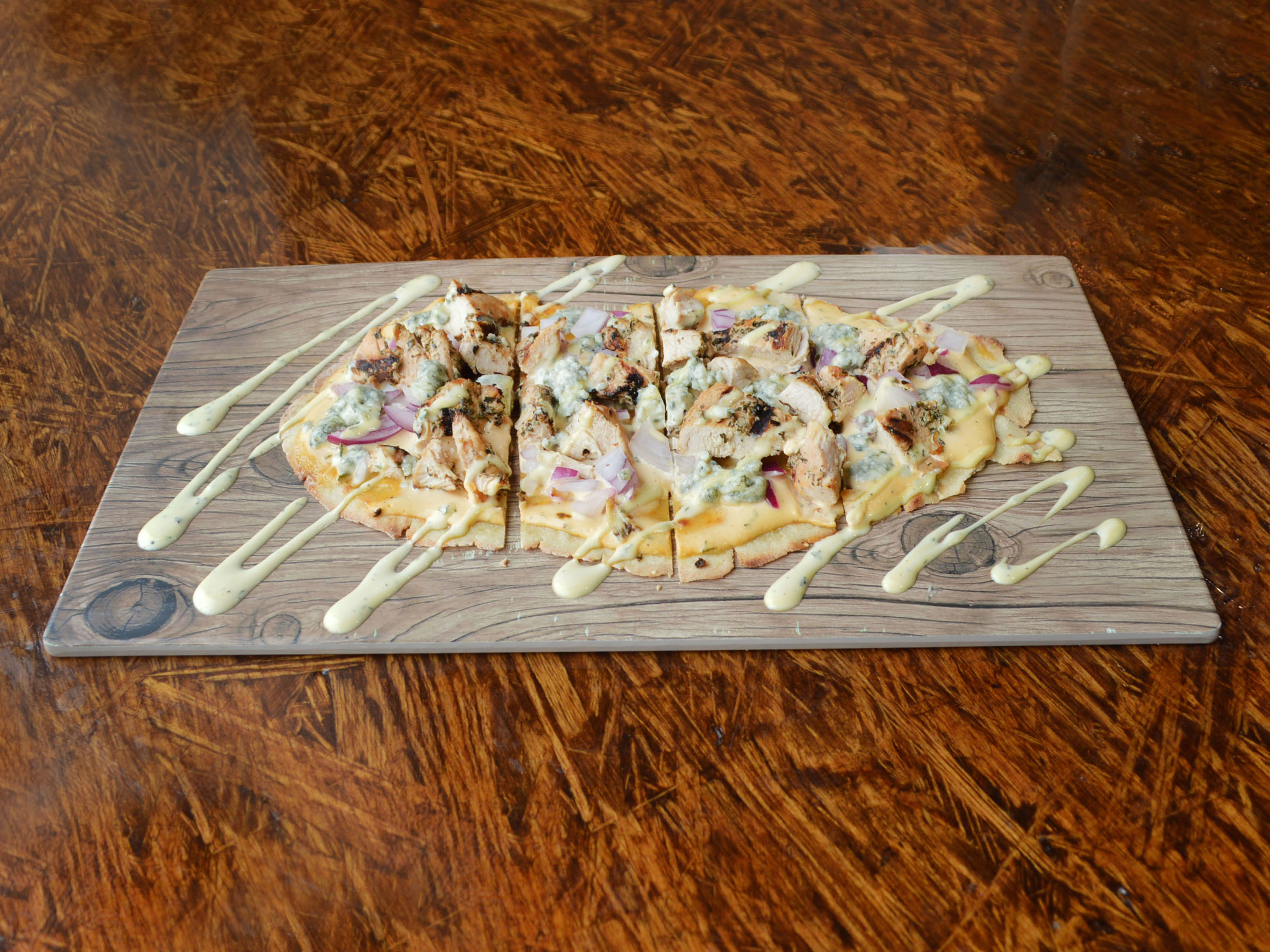 Order Buffalo Chicken Flatbread food online from Butter It Up store, Huntington on bringmethat.com