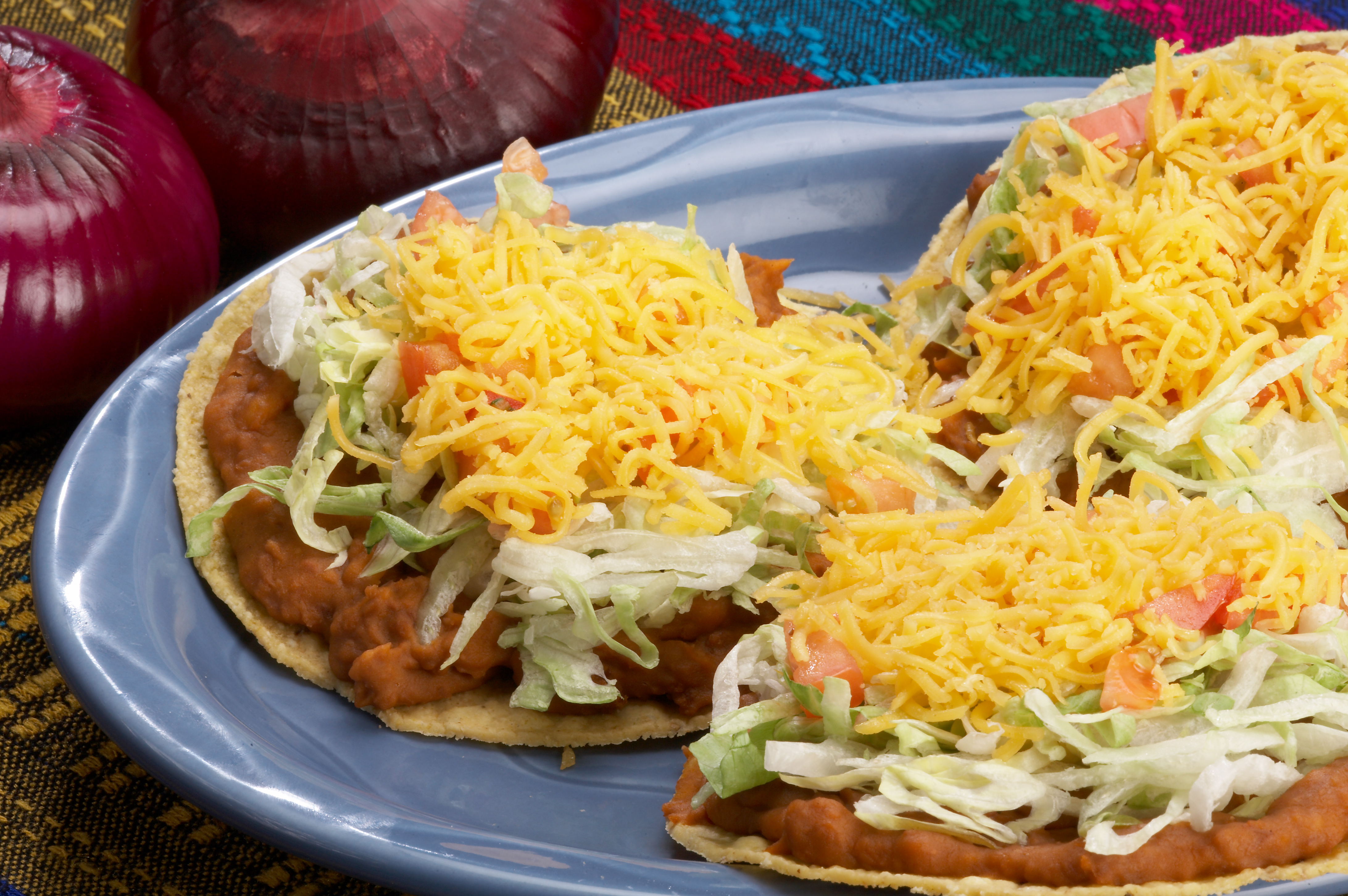 Order Order of 3 Tostadas food online from Rudy's Tacos - 11th St. store, Davenport on bringmethat.com