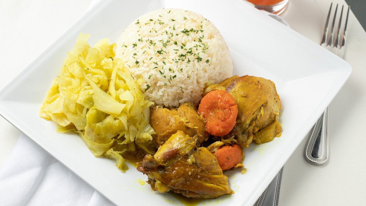 Order Curry Chicken food online from Irie Nation Restaurant & Bar store, Charlotte on bringmethat.com