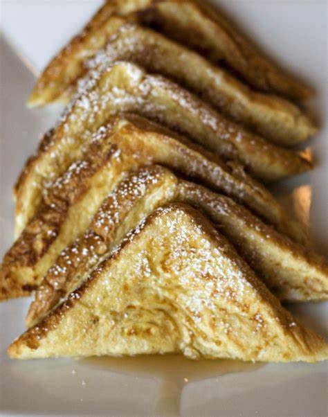 Order 1/2  FRENCH TOAST food online from Leo's Coney Island store, Sterling Heights on bringmethat.com